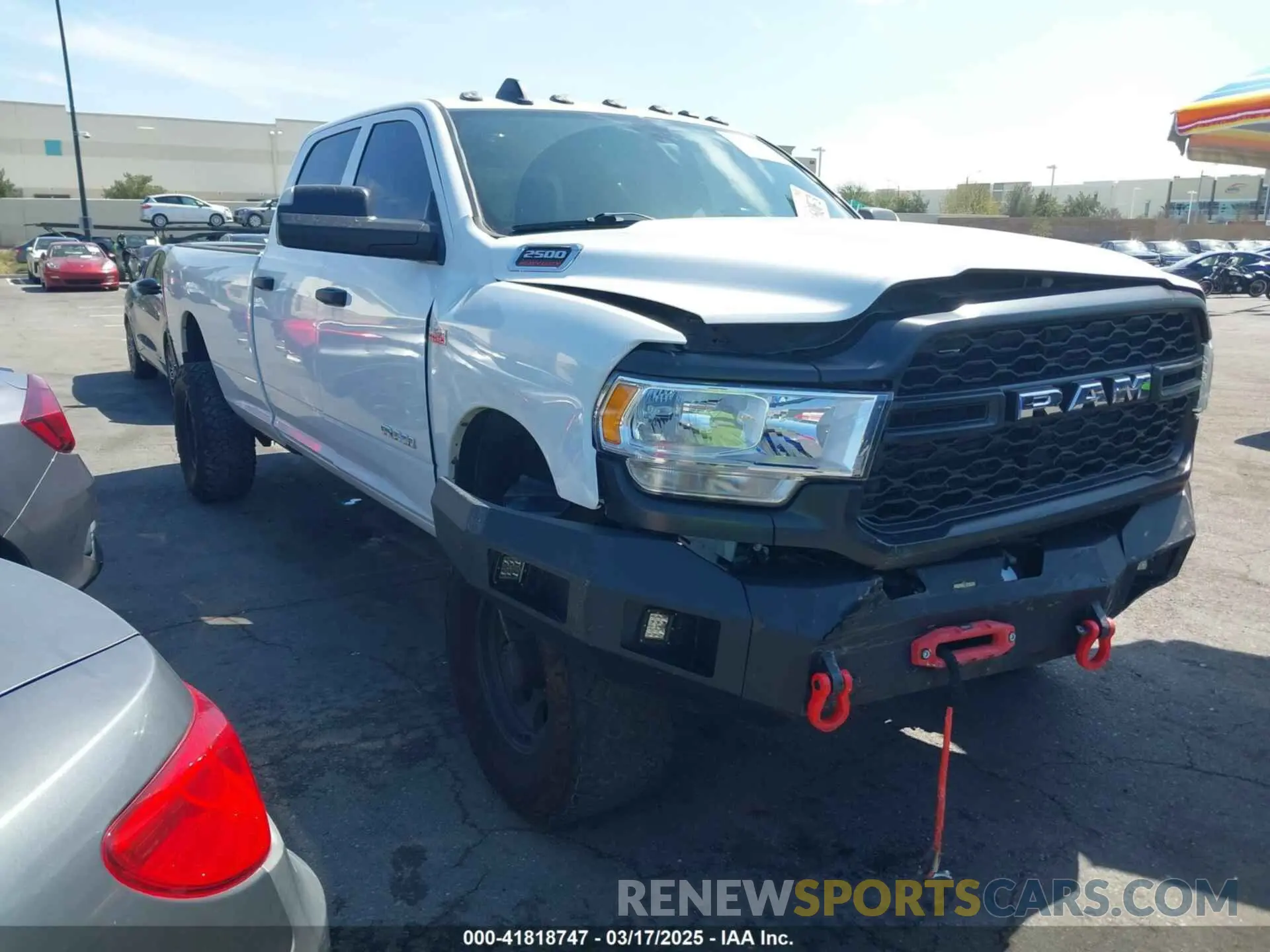 1 Photograph of a damaged car 3C6UR5HJ5MG606694 RAM 2500 2021