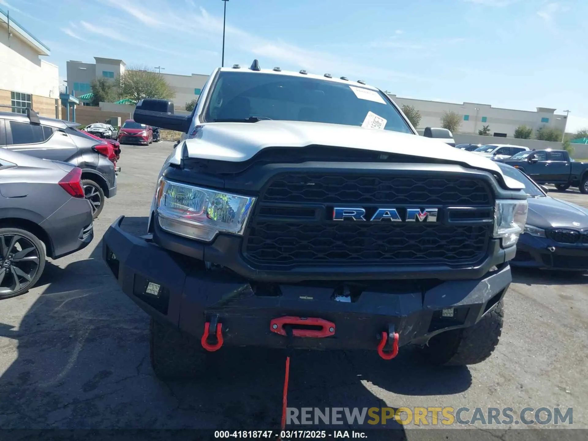 13 Photograph of a damaged car 3C6UR5HJ5MG606694 RAM 2500 2021