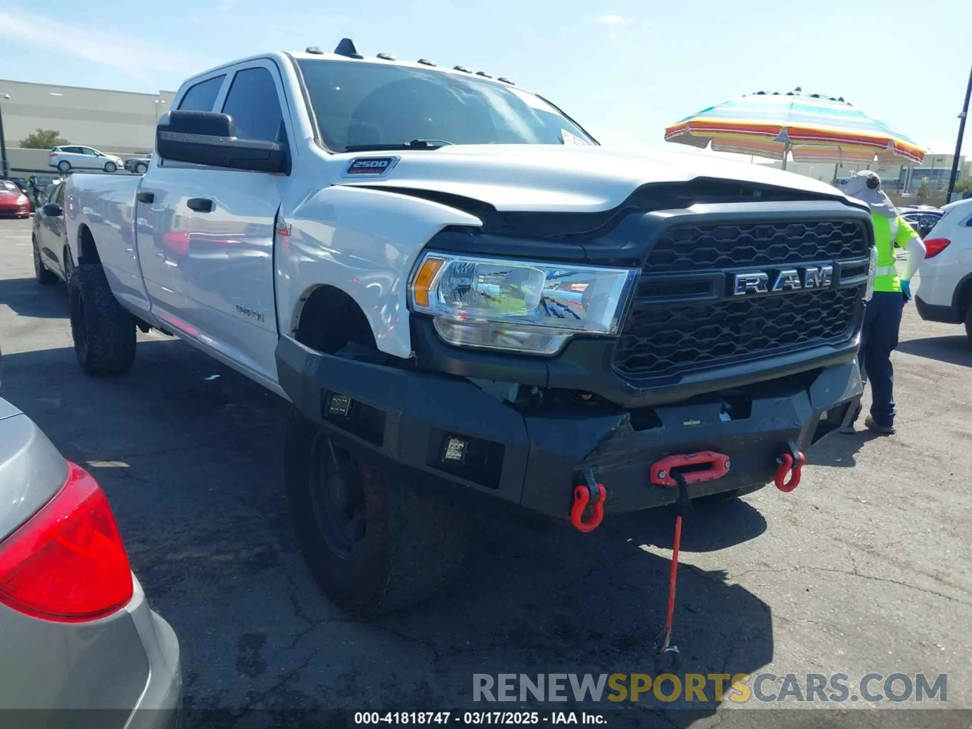 14 Photograph of a damaged car 3C6UR5HJ5MG606694 RAM 2500 2021