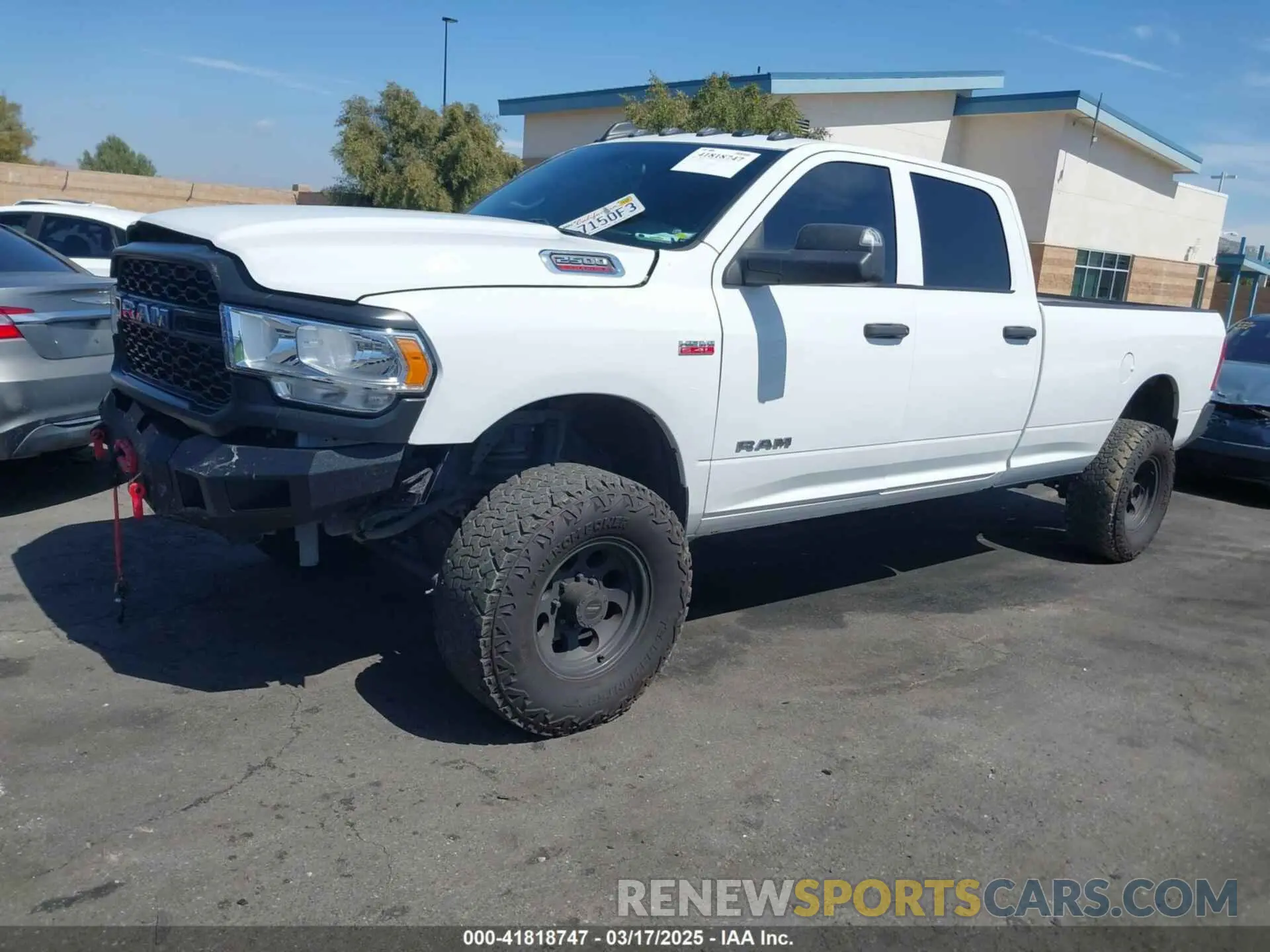 2 Photograph of a damaged car 3C6UR5HJ5MG606694 RAM 2500 2021