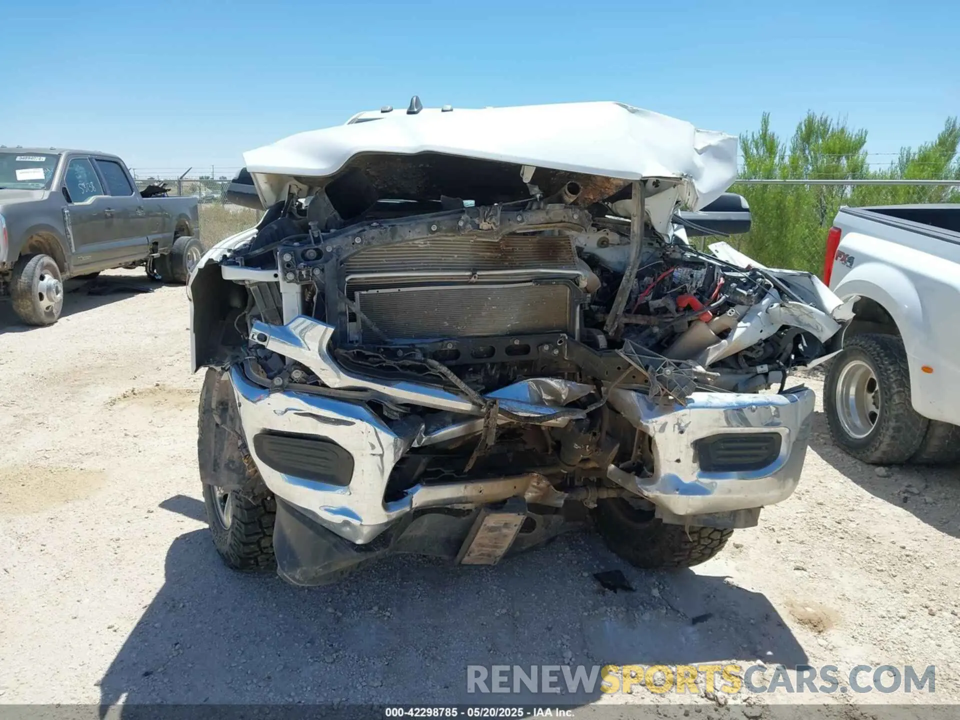12 Photograph of a damaged car 3C6UR5HJ6MG698589 RAM 2500 2021