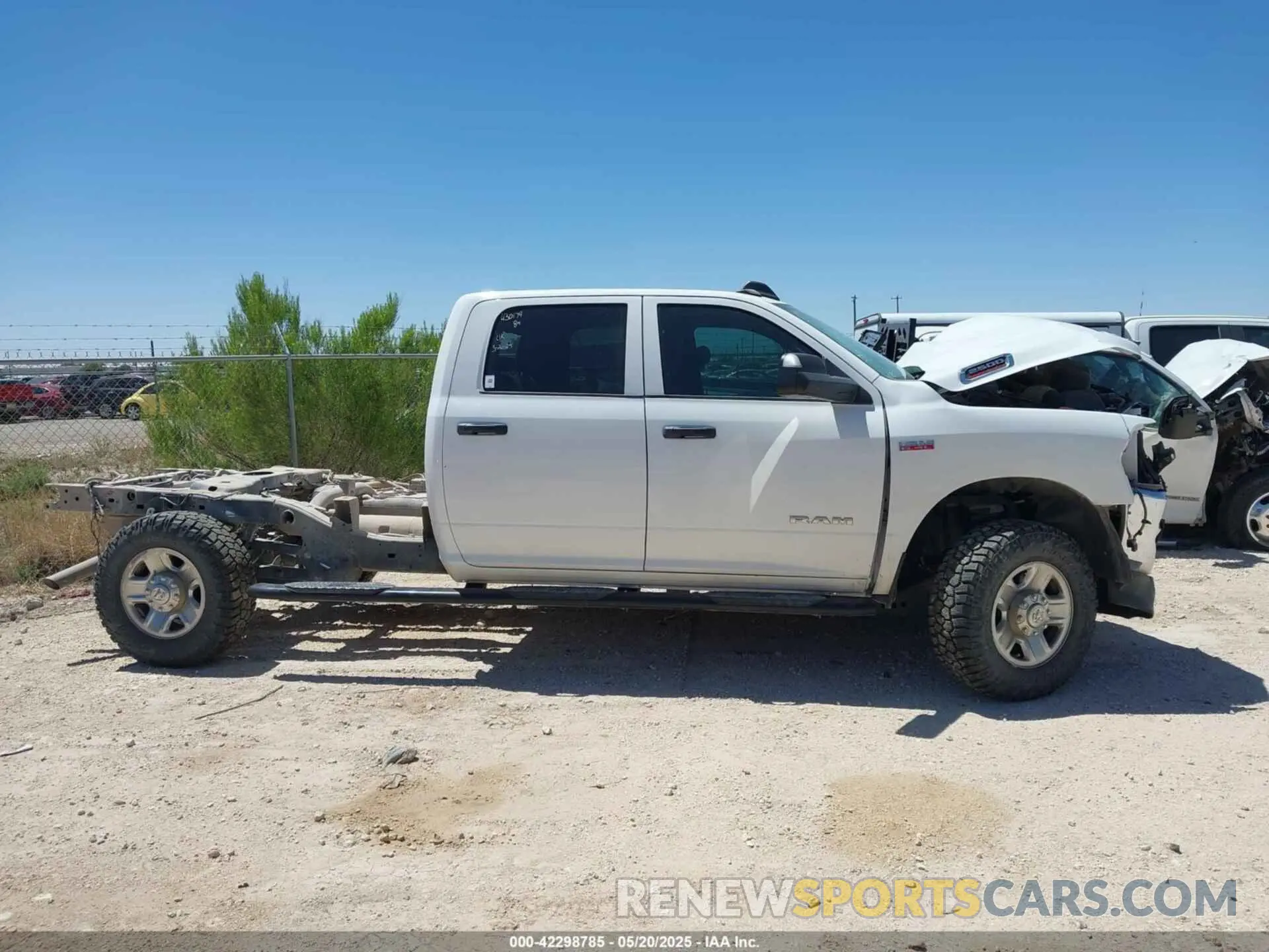 13 Photograph of a damaged car 3C6UR5HJ6MG698589 RAM 2500 2021