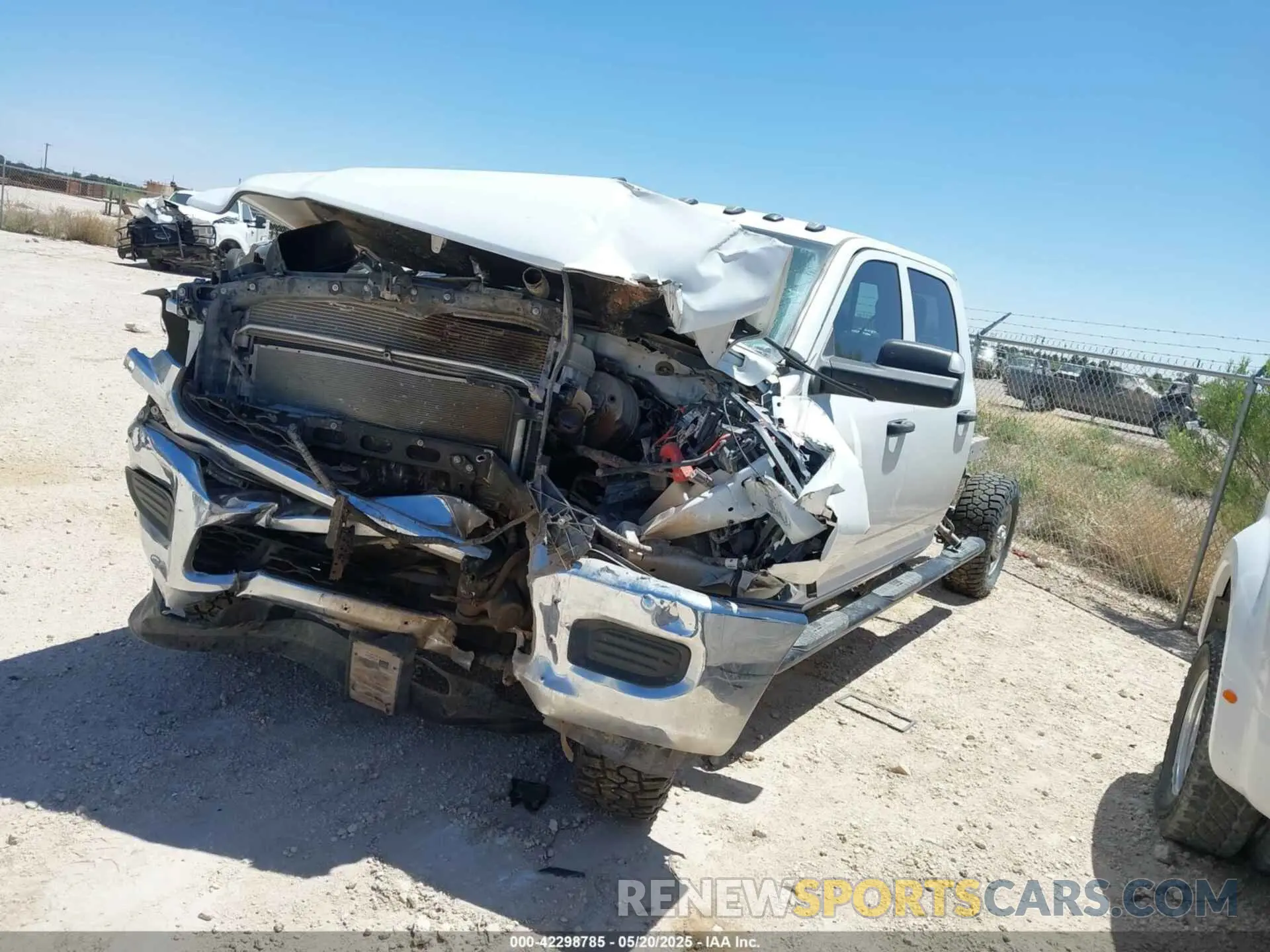 14 Photograph of a damaged car 3C6UR5HJ6MG698589 RAM 2500 2021
