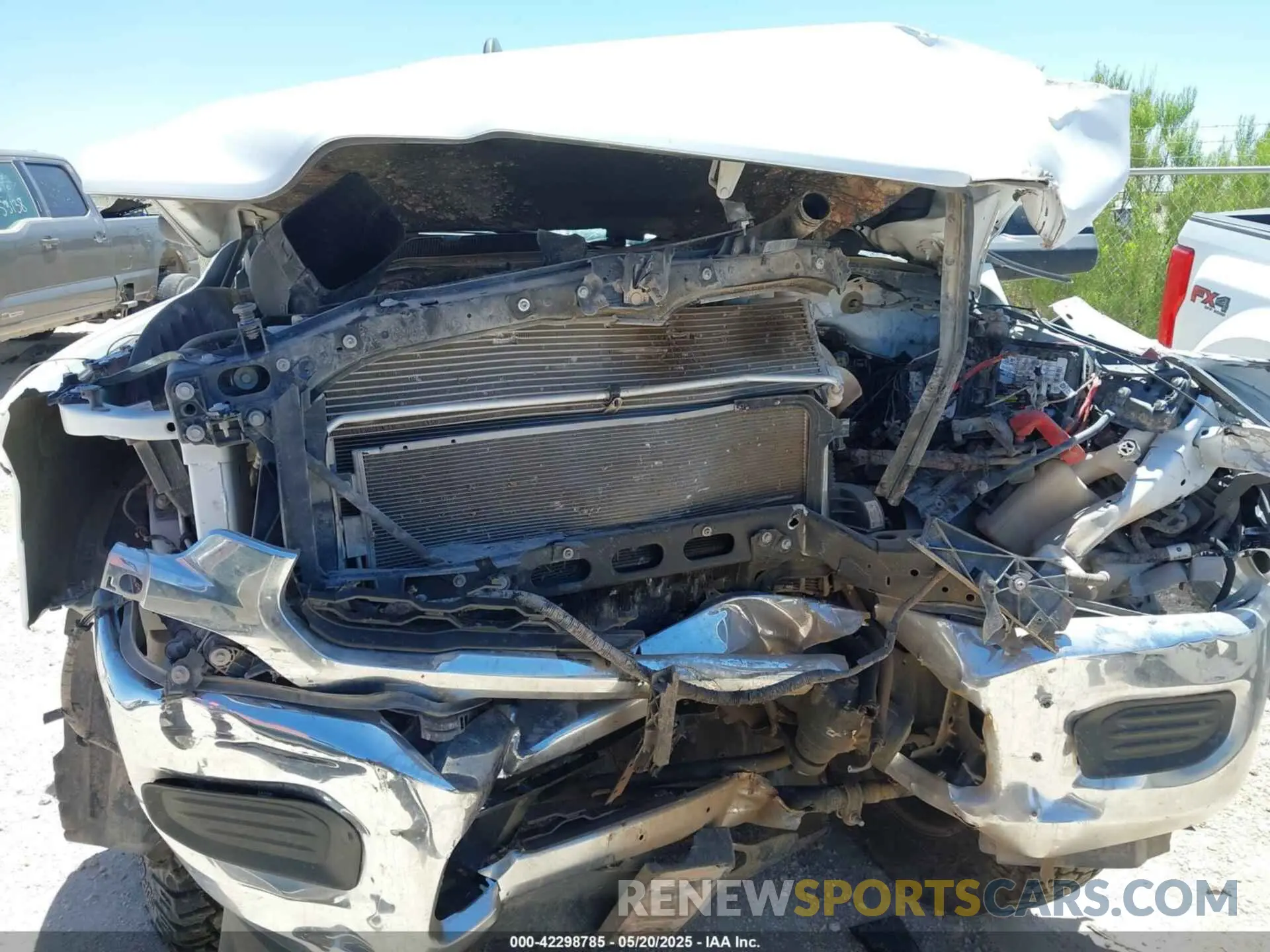 6 Photograph of a damaged car 3C6UR5HJ6MG698589 RAM 2500 2021