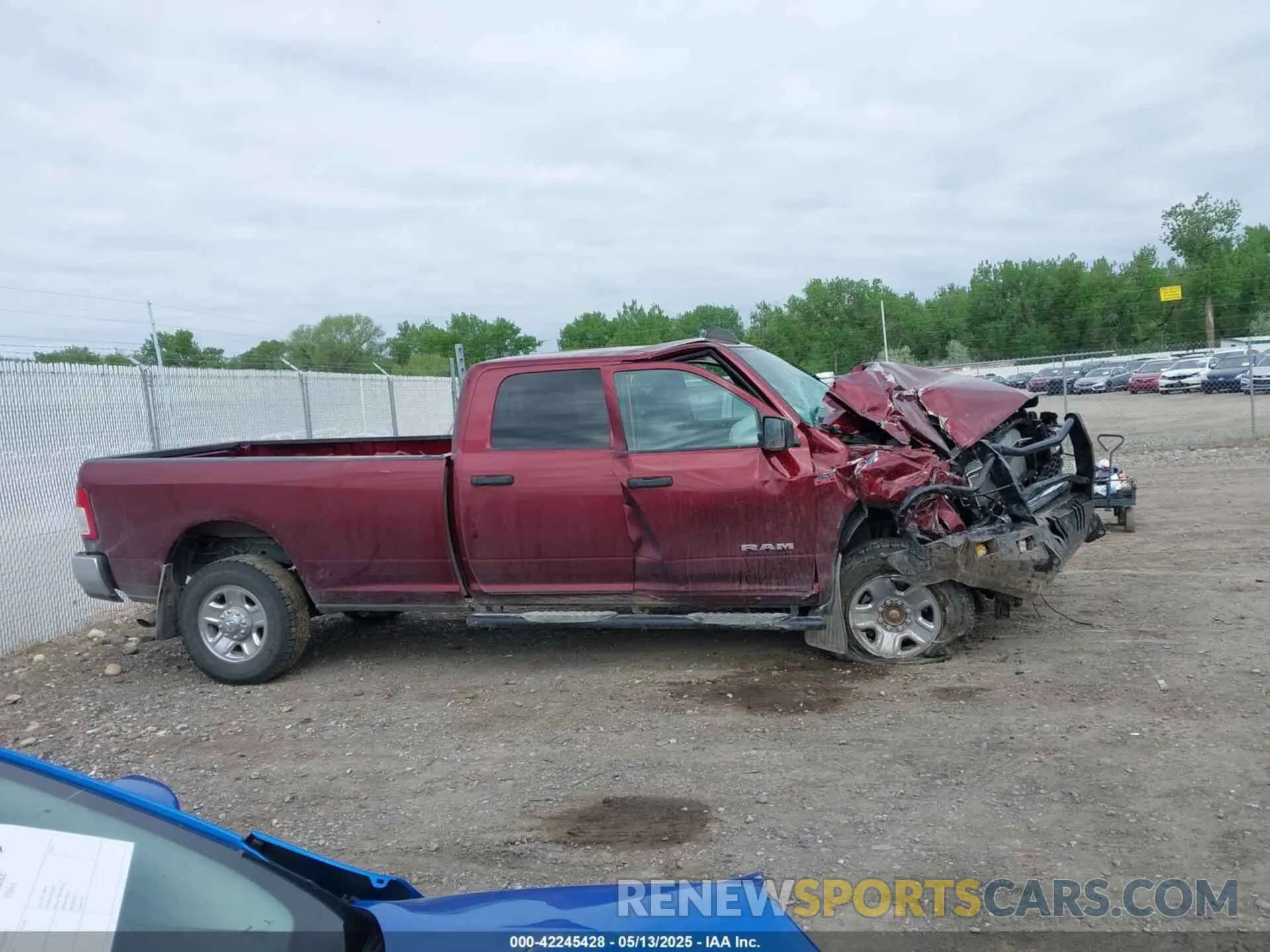 14 Photograph of a damaged car 3C6UR5HJ8MG661057 RAM 2500 2021