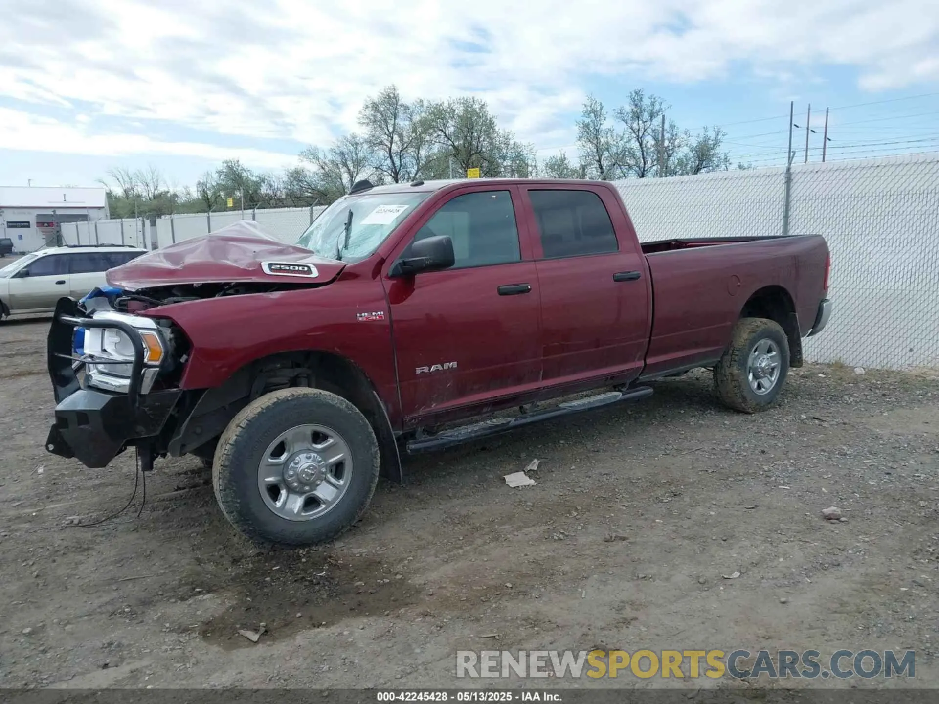 2 Photograph of a damaged car 3C6UR5HJ8MG661057 RAM 2500 2021