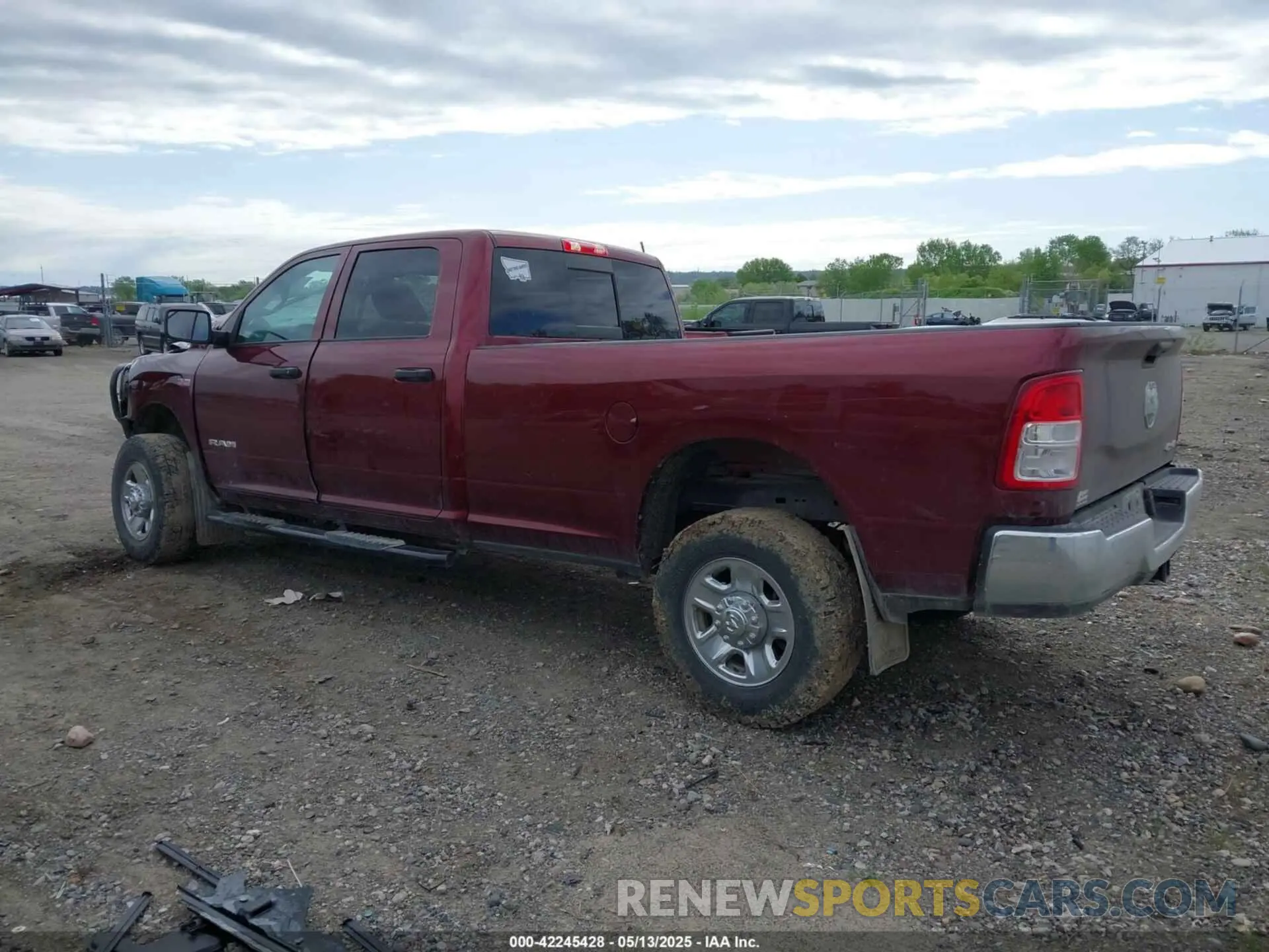 3 Photograph of a damaged car 3C6UR5HJ8MG661057 RAM 2500 2021