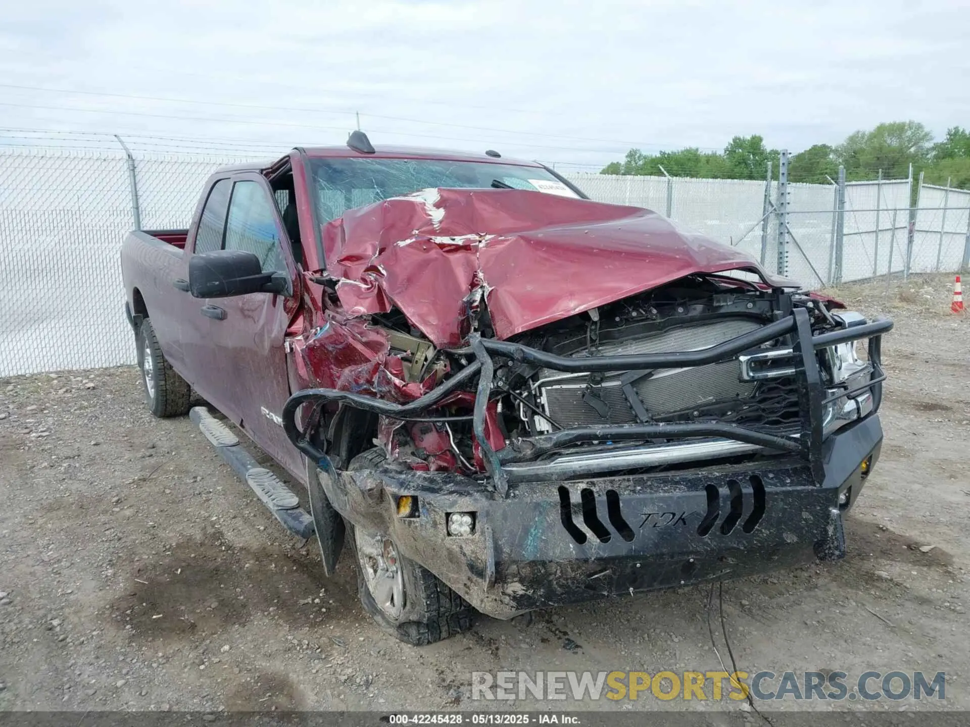6 Photograph of a damaged car 3C6UR5HJ8MG661057 RAM 2500 2021