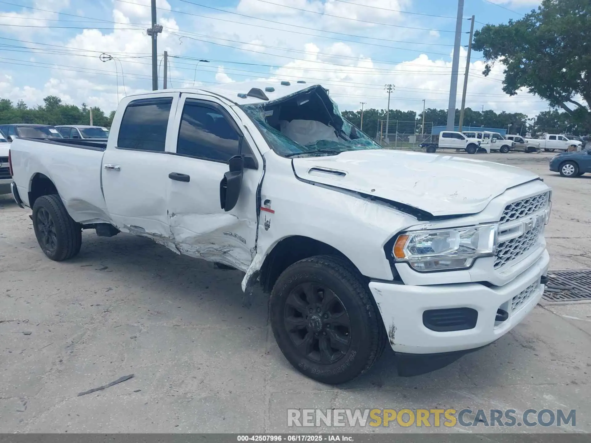 1 Photograph of a damaged car 3C6UR5HL3MG650257 RAM 2500 2021