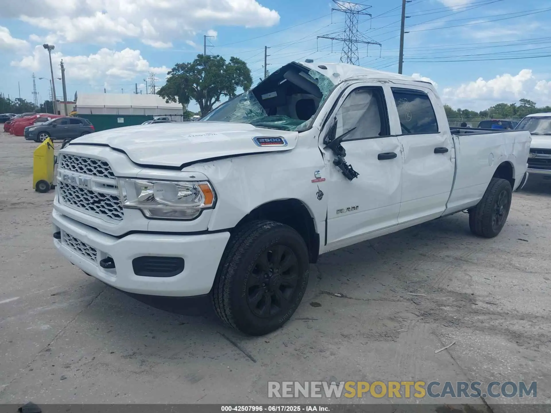 2 Photograph of a damaged car 3C6UR5HL3MG650257 RAM 2500 2021