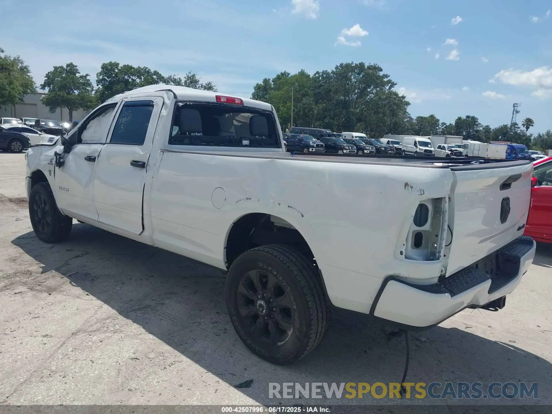 3 Photograph of a damaged car 3C6UR5HL3MG650257 RAM 2500 2021