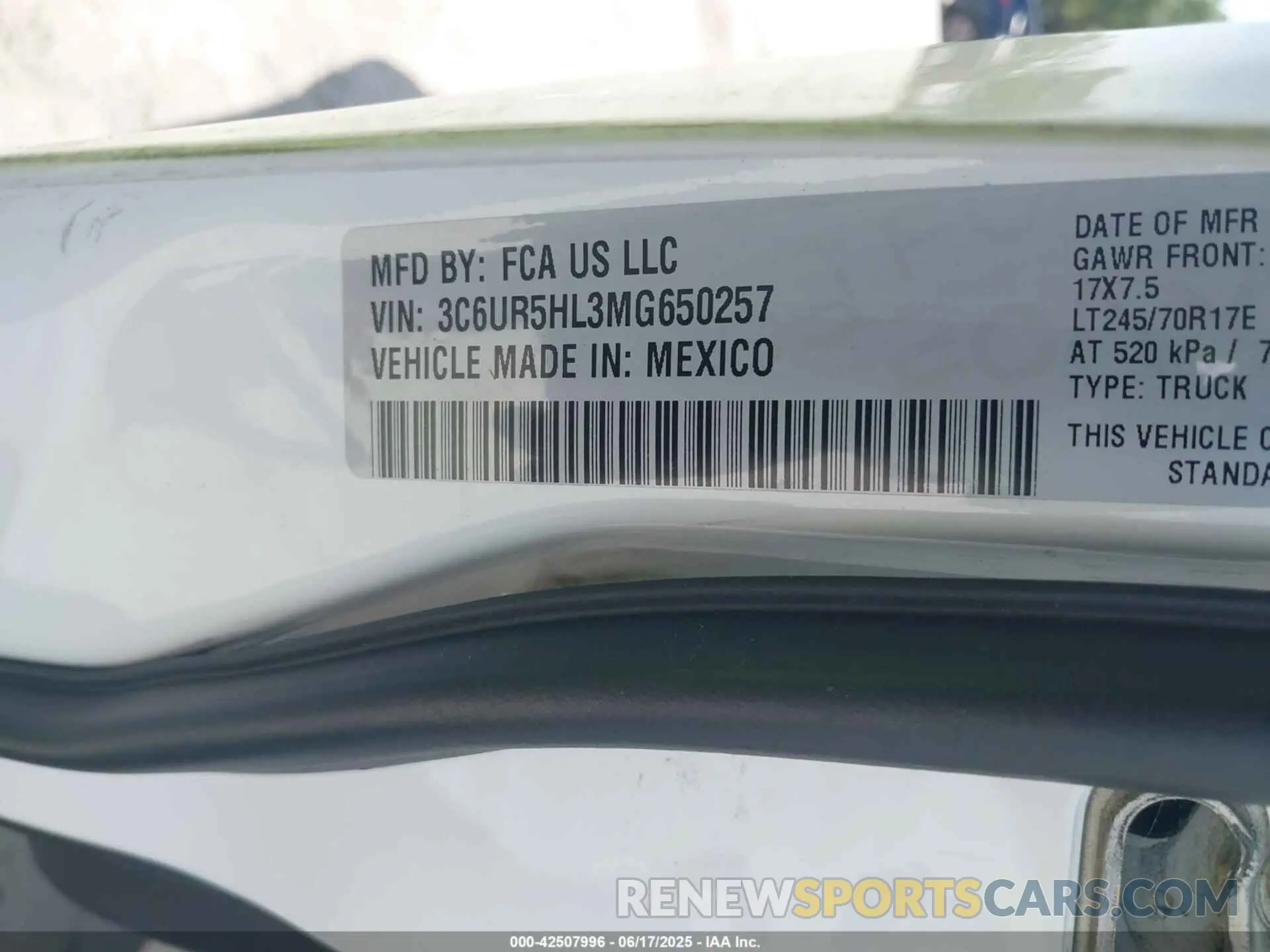 9 Photograph of a damaged car 3C6UR5HL3MG650257 RAM 2500 2021