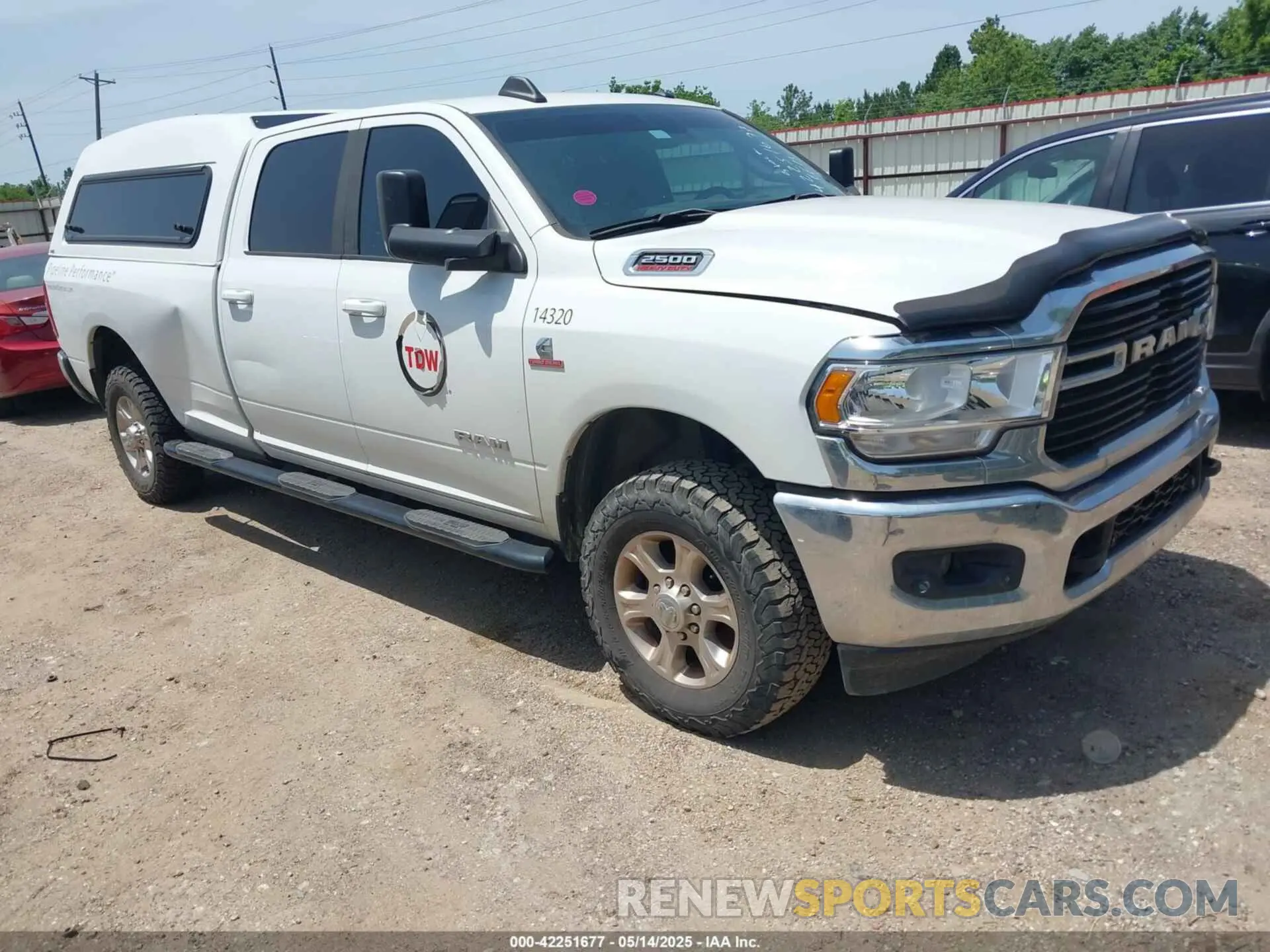 1 Photograph of a damaged car 3C6UR5JL1MG652017 RAM 2500 2021