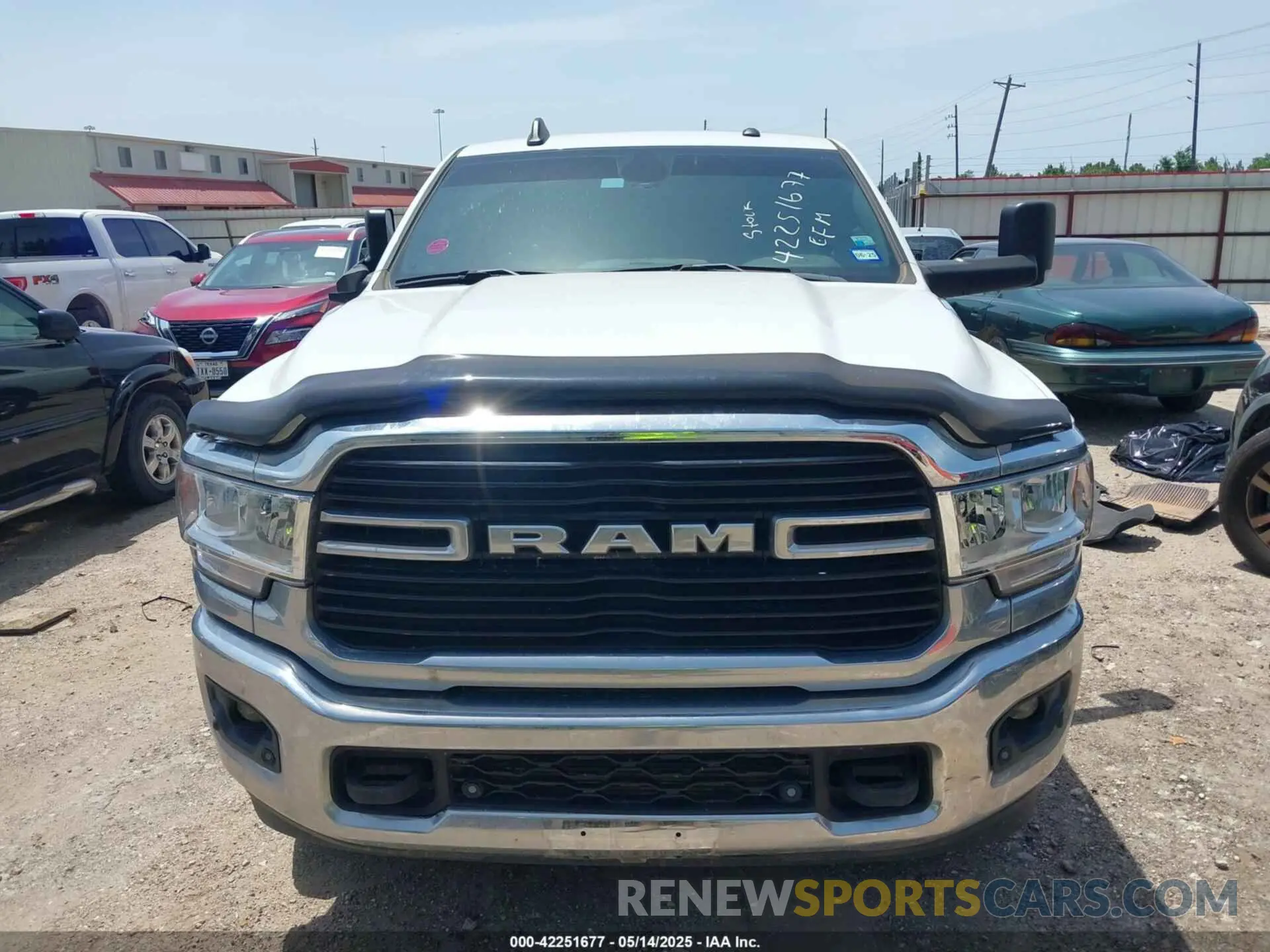 13 Photograph of a damaged car 3C6UR5JL1MG652017 RAM 2500 2021
