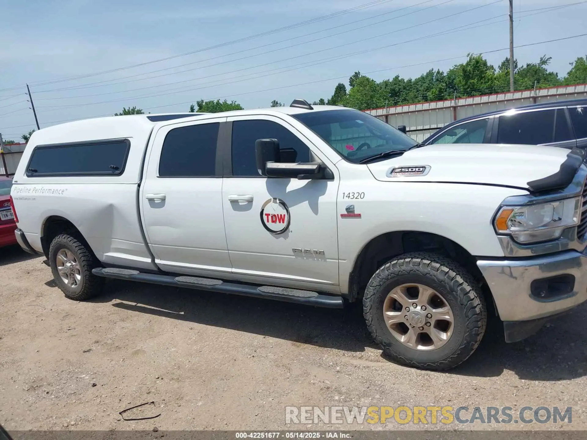 14 Photograph of a damaged car 3C6UR5JL1MG652017 RAM 2500 2021