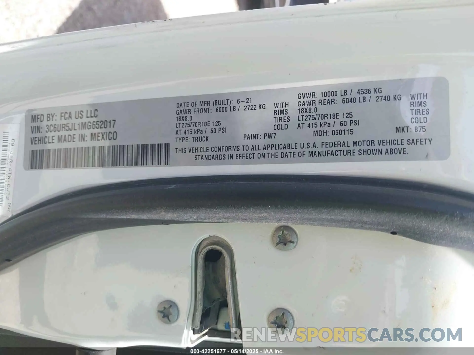 9 Photograph of a damaged car 3C6UR5JL1MG652017 RAM 2500 2021