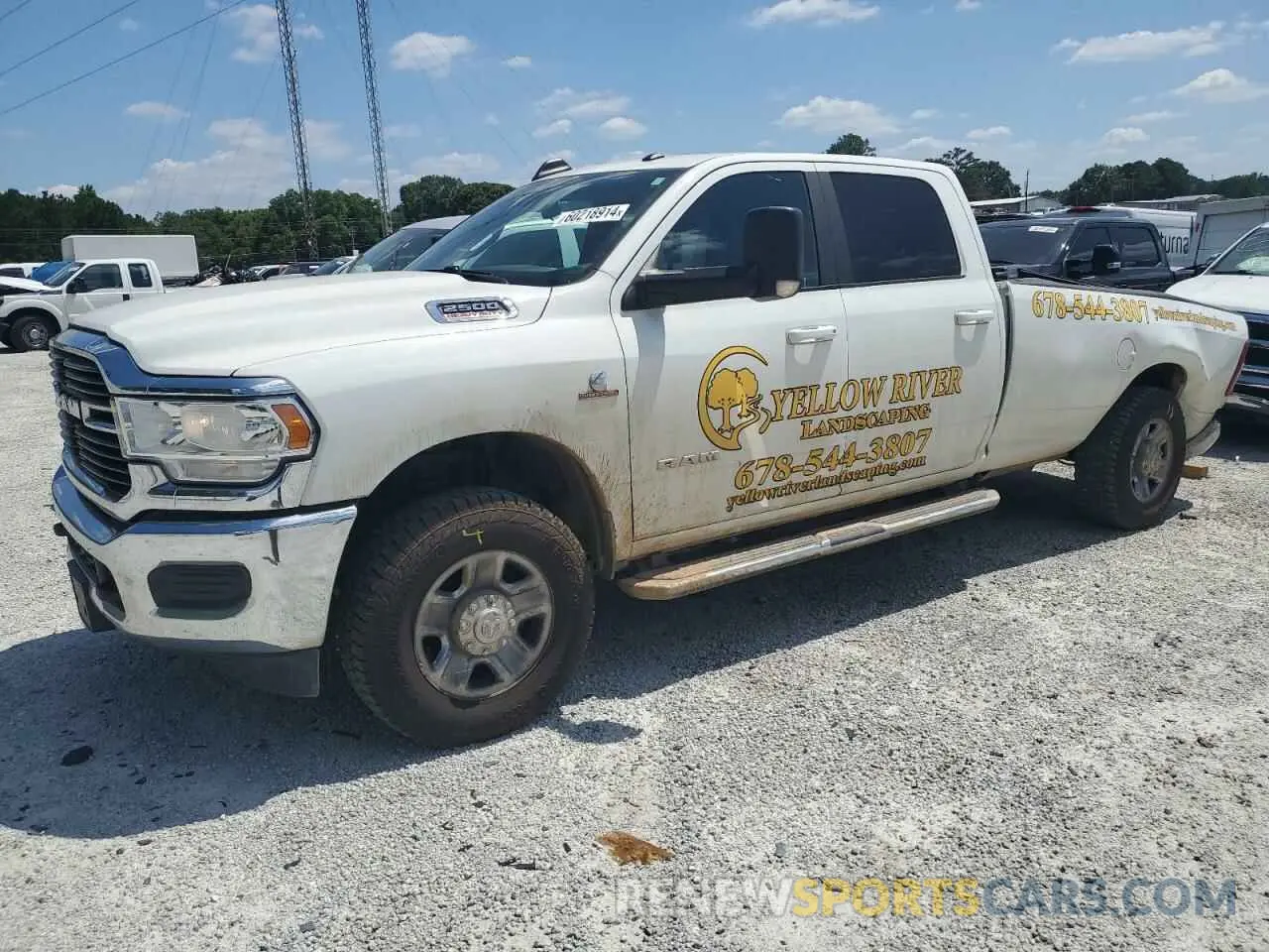 1 Photograph of a damaged car 3C6UR5JL2MG554761 RAM 2500 2021