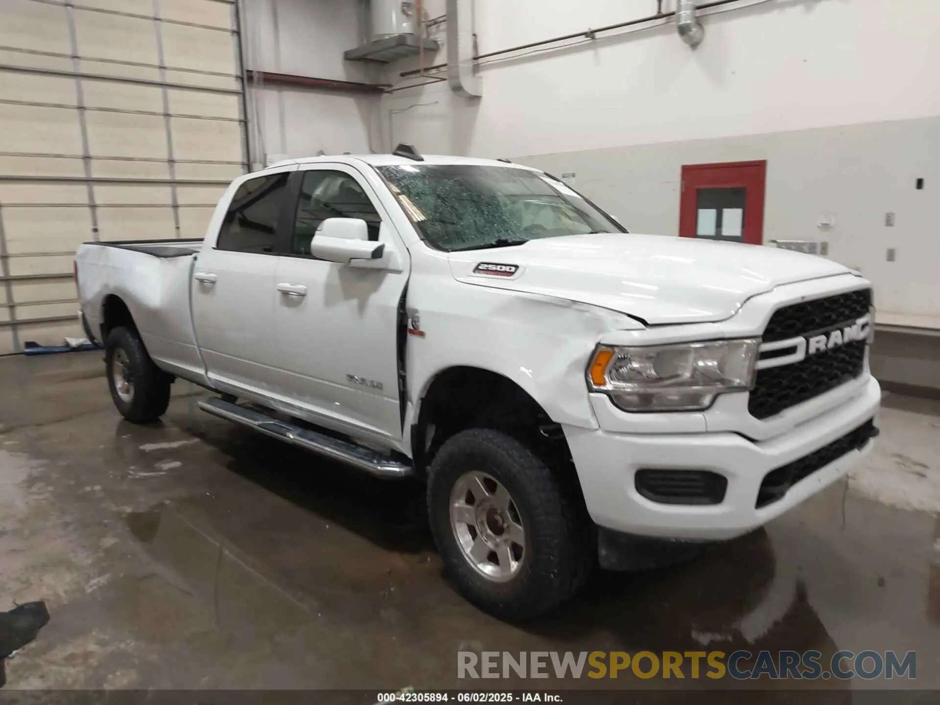 1 Photograph of a damaged car 3C6UR5JL5MG554642 RAM 2500 2021