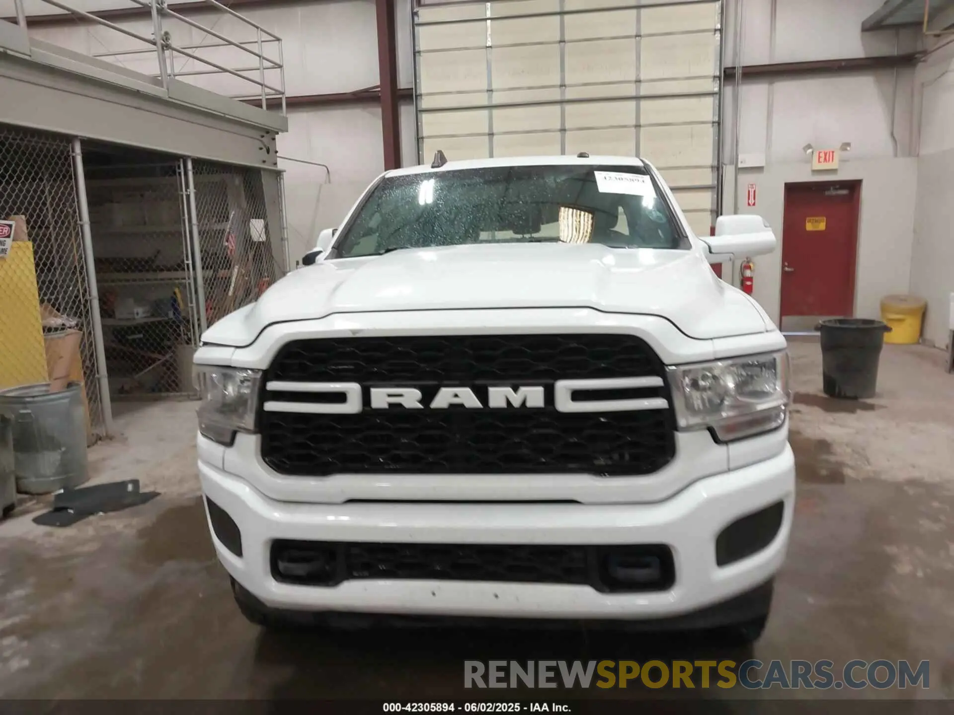 12 Photograph of a damaged car 3C6UR5JL5MG554642 RAM 2500 2021