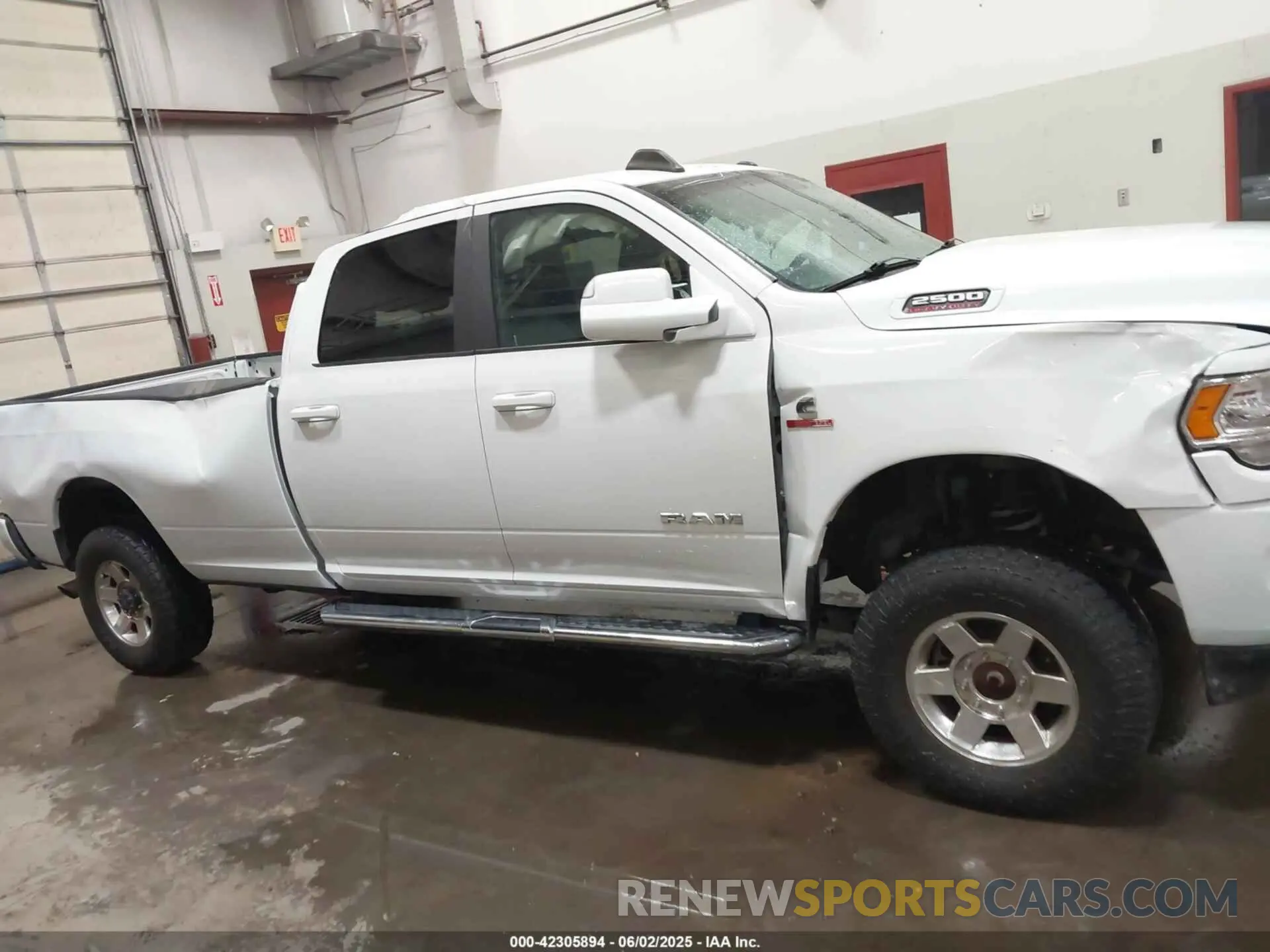 13 Photograph of a damaged car 3C6UR5JL5MG554642 RAM 2500 2021