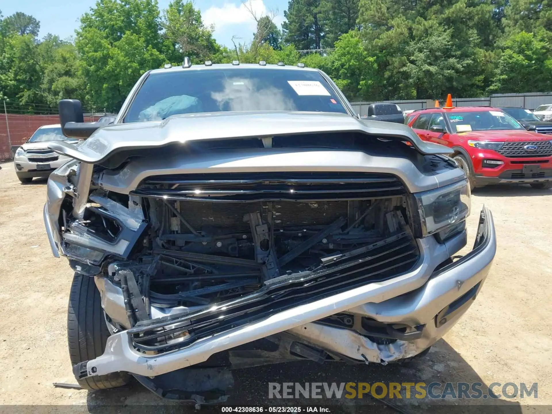 13 Photograph of a damaged car 3C6UR5NL2MG509717 RAM 2500 2021