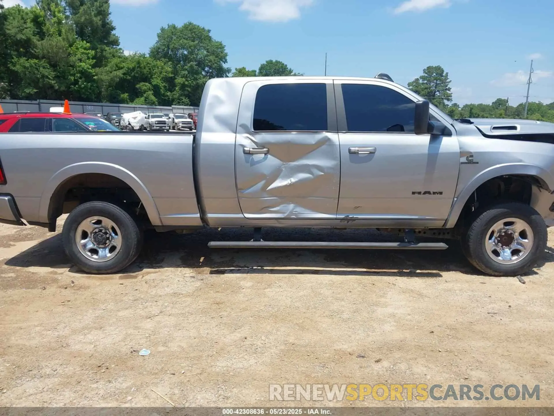 14 Photograph of a damaged car 3C6UR5NL2MG509717 RAM 2500 2021