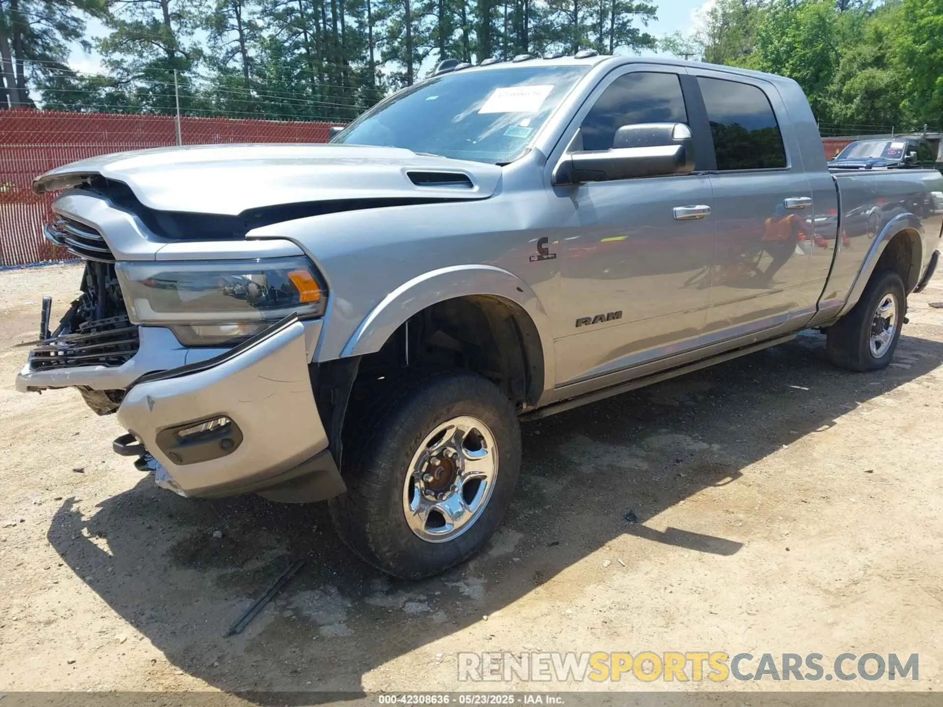2 Photograph of a damaged car 3C6UR5NL2MG509717 RAM 2500 2021