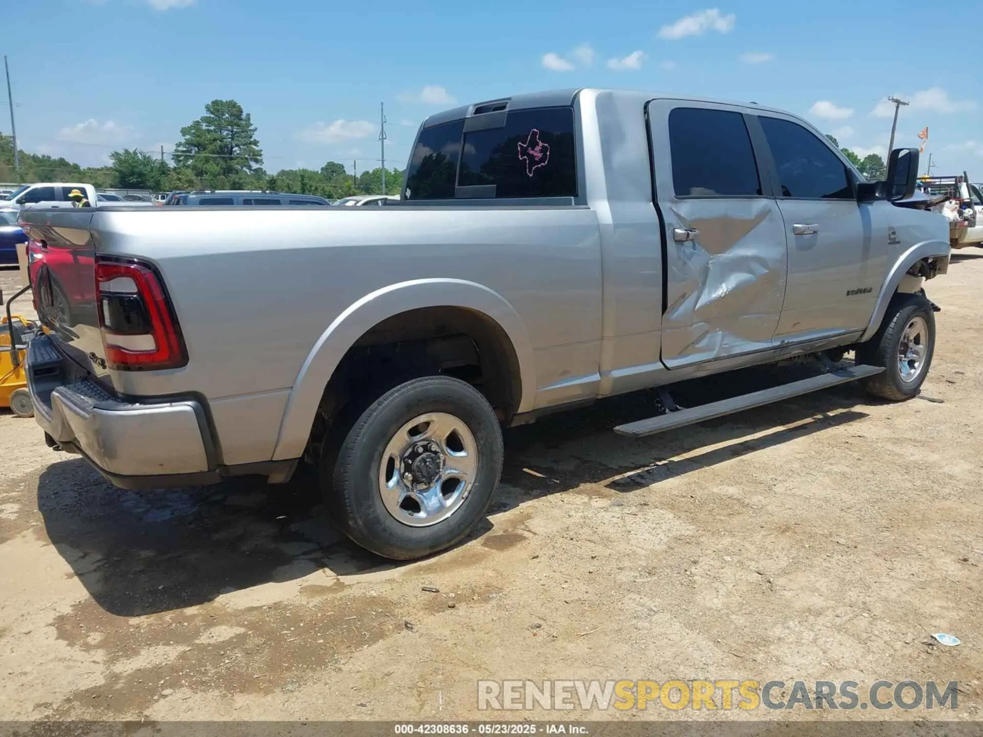 4 Photograph of a damaged car 3C6UR5NL2MG509717 RAM 2500 2021