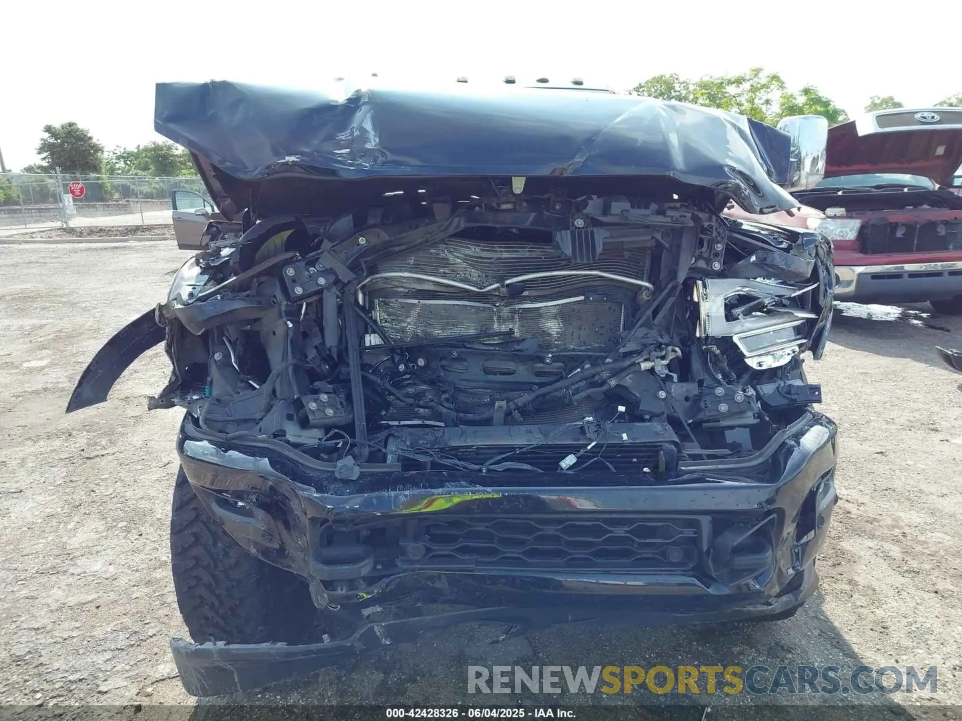 12 Photograph of a damaged car 3C6UR5NL4MG677827 RAM 2500 2021