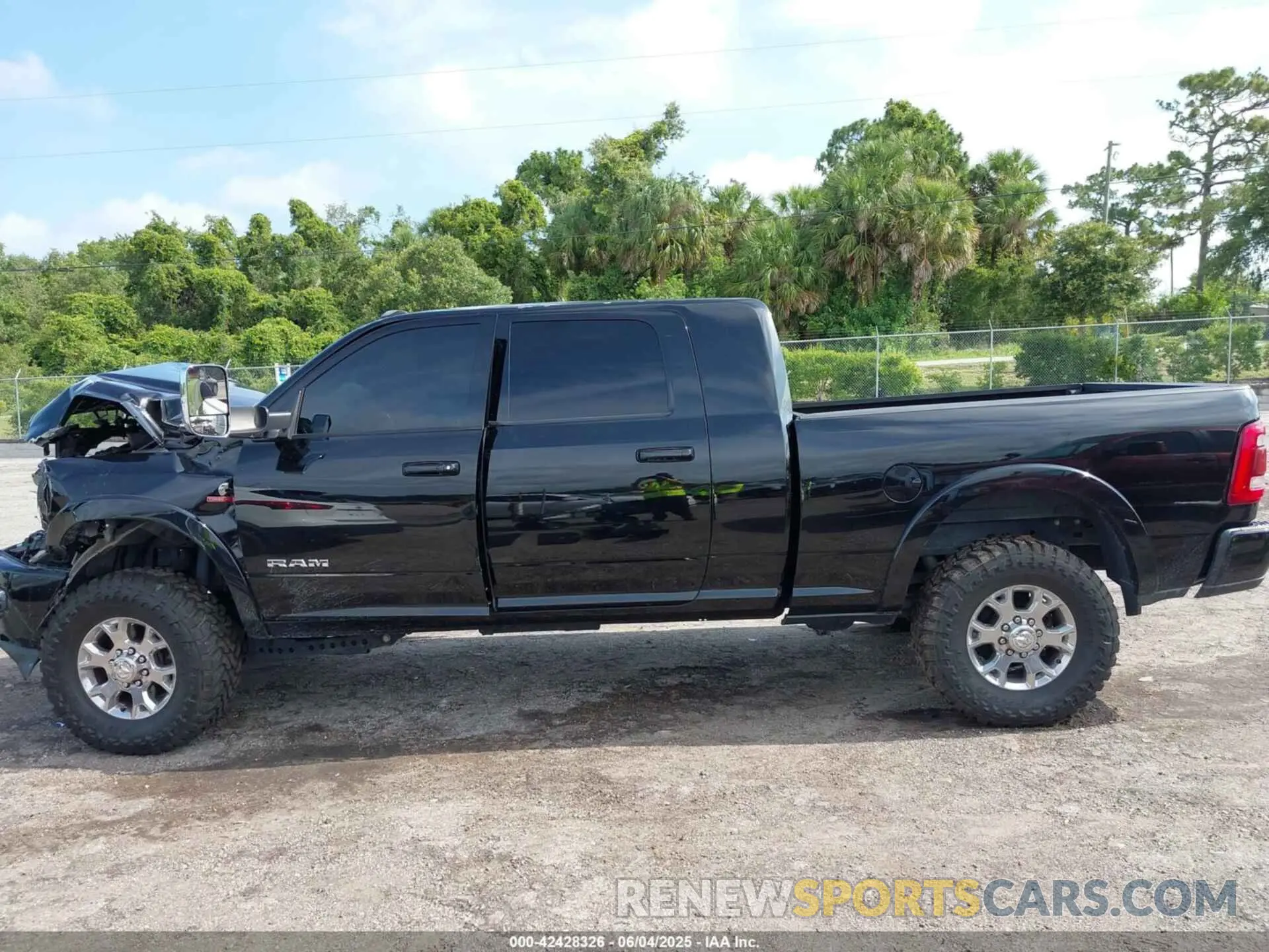 14 Photograph of a damaged car 3C6UR5NL4MG677827 RAM 2500 2021