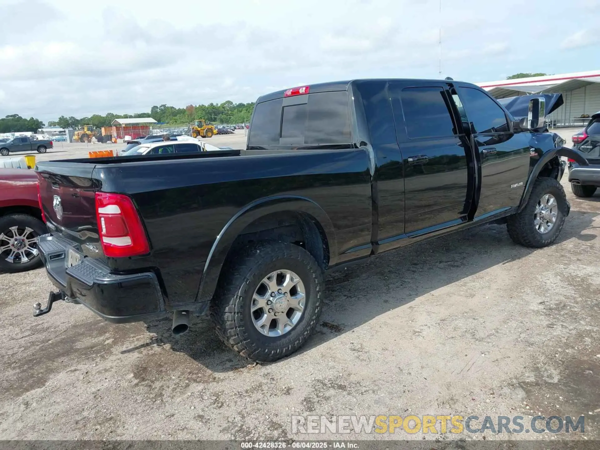 4 Photograph of a damaged car 3C6UR5NL4MG677827 RAM 2500 2021