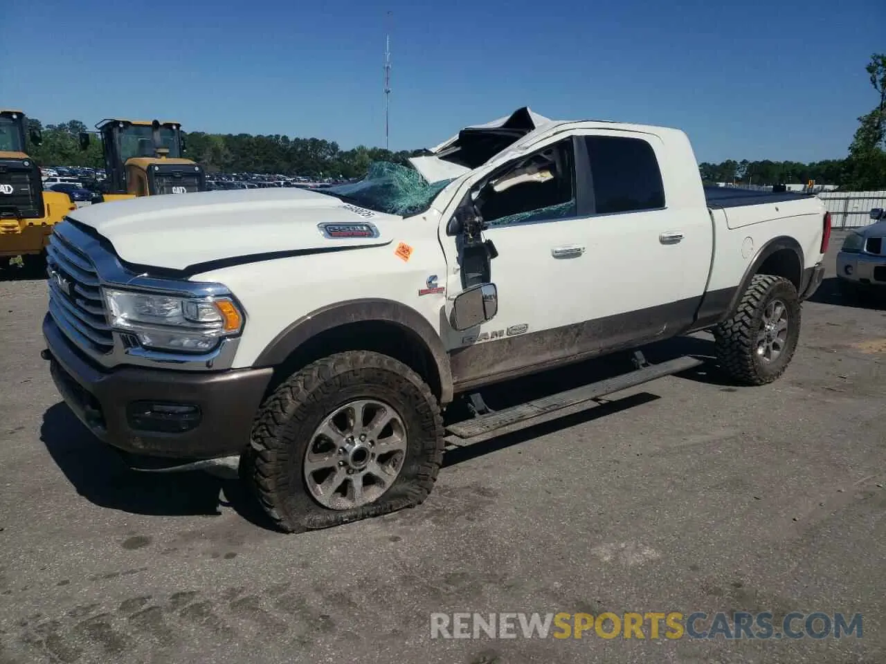 1 Photograph of a damaged car 3C6UR5PL3MG597335 RAM 2500 2021