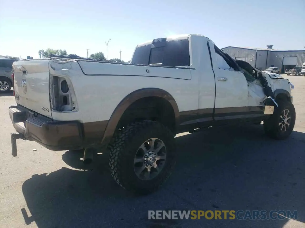 3 Photograph of a damaged car 3C6UR5PL3MG597335 RAM 2500 2021