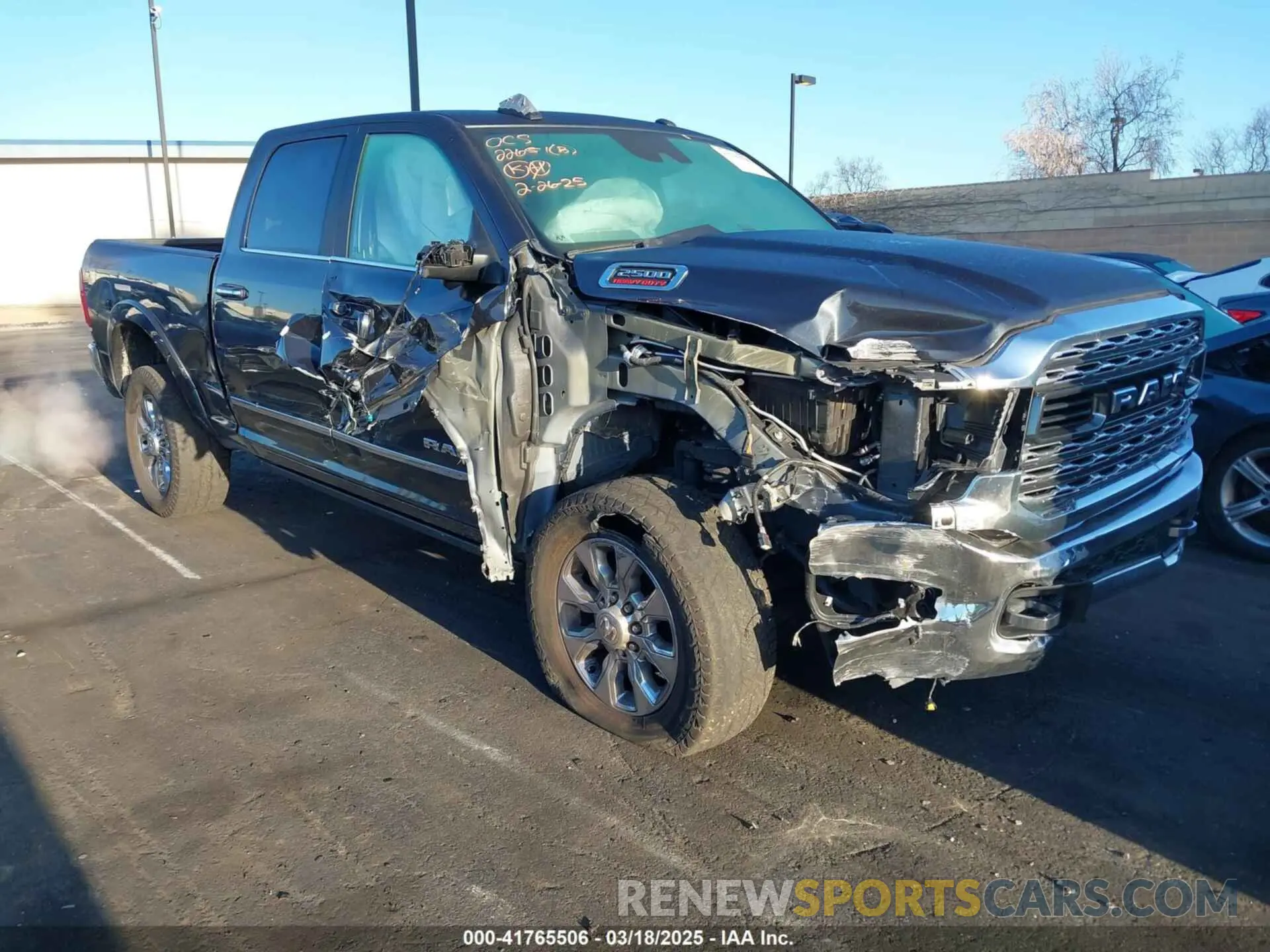 1 Photograph of a damaged car 3C6UR5SJ5MG500657 RAM 2500 2021