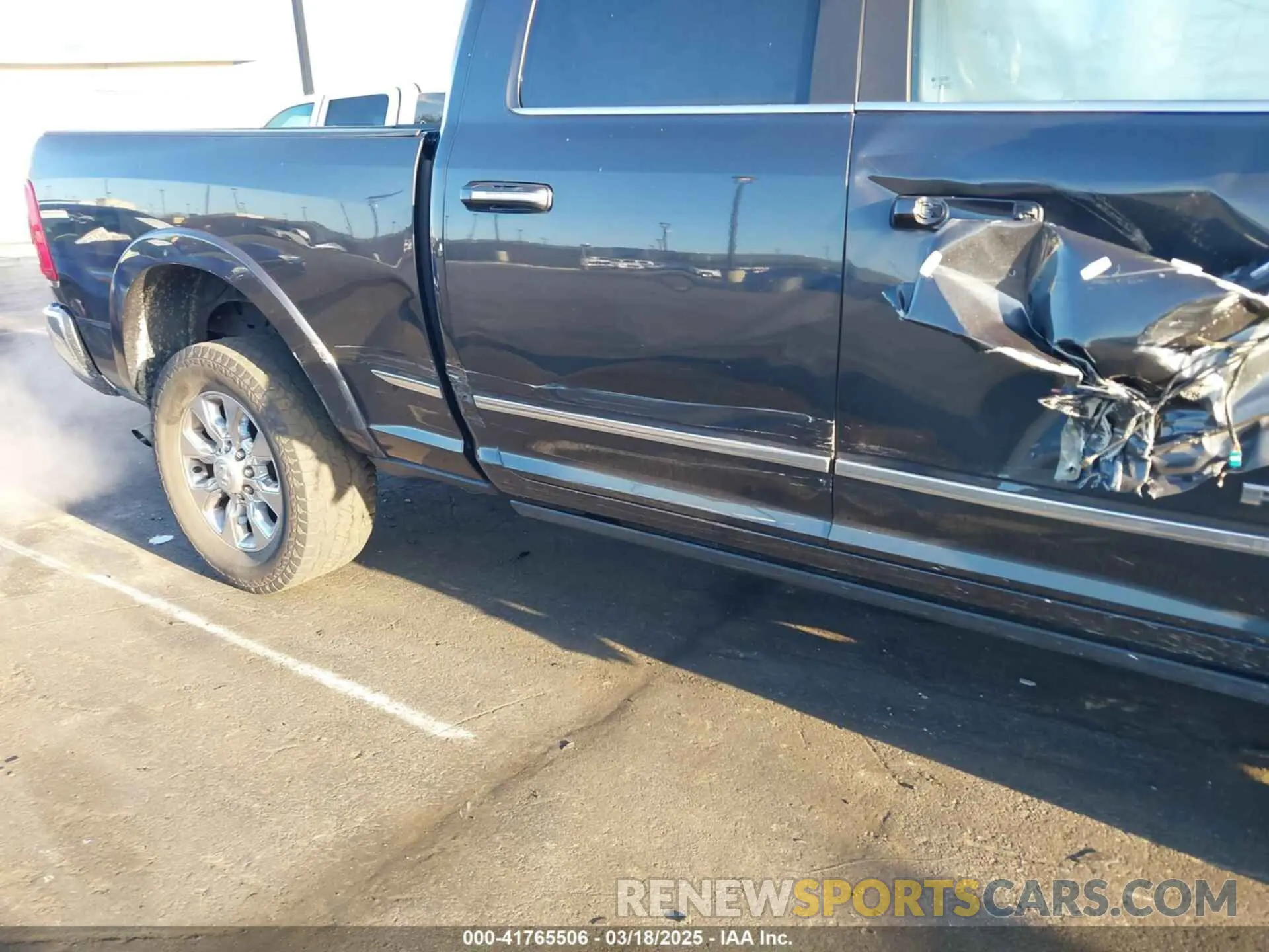 12 Photograph of a damaged car 3C6UR5SJ5MG500657 RAM 2500 2021