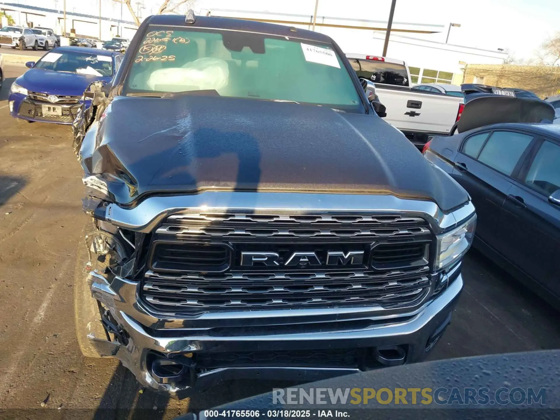 13 Photograph of a damaged car 3C6UR5SJ5MG500657 RAM 2500 2021
