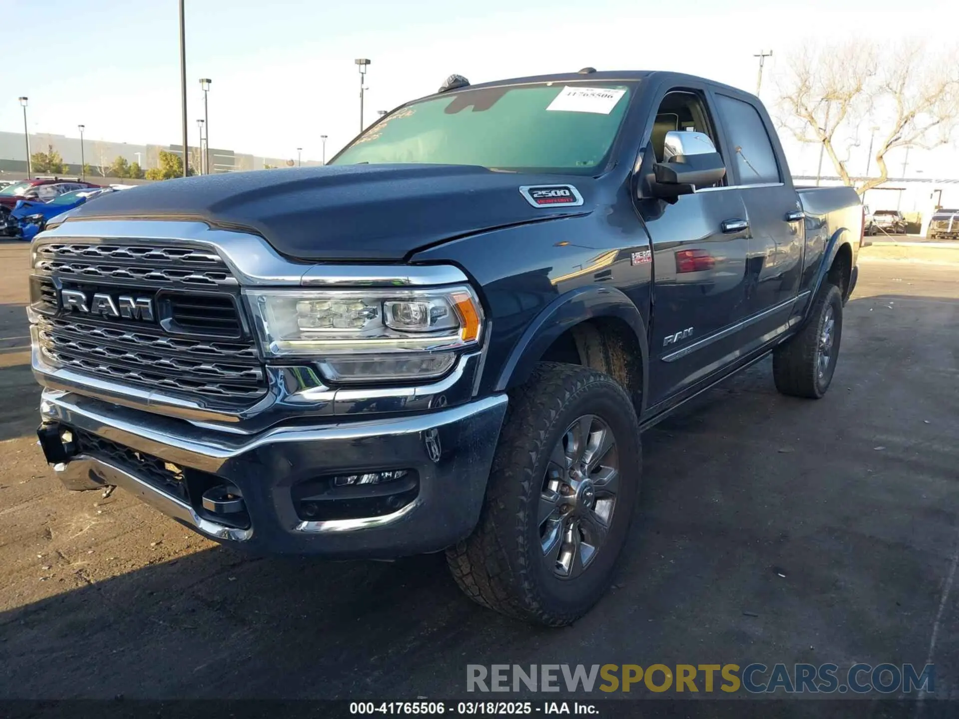 2 Photograph of a damaged car 3C6UR5SJ5MG500657 RAM 2500 2021