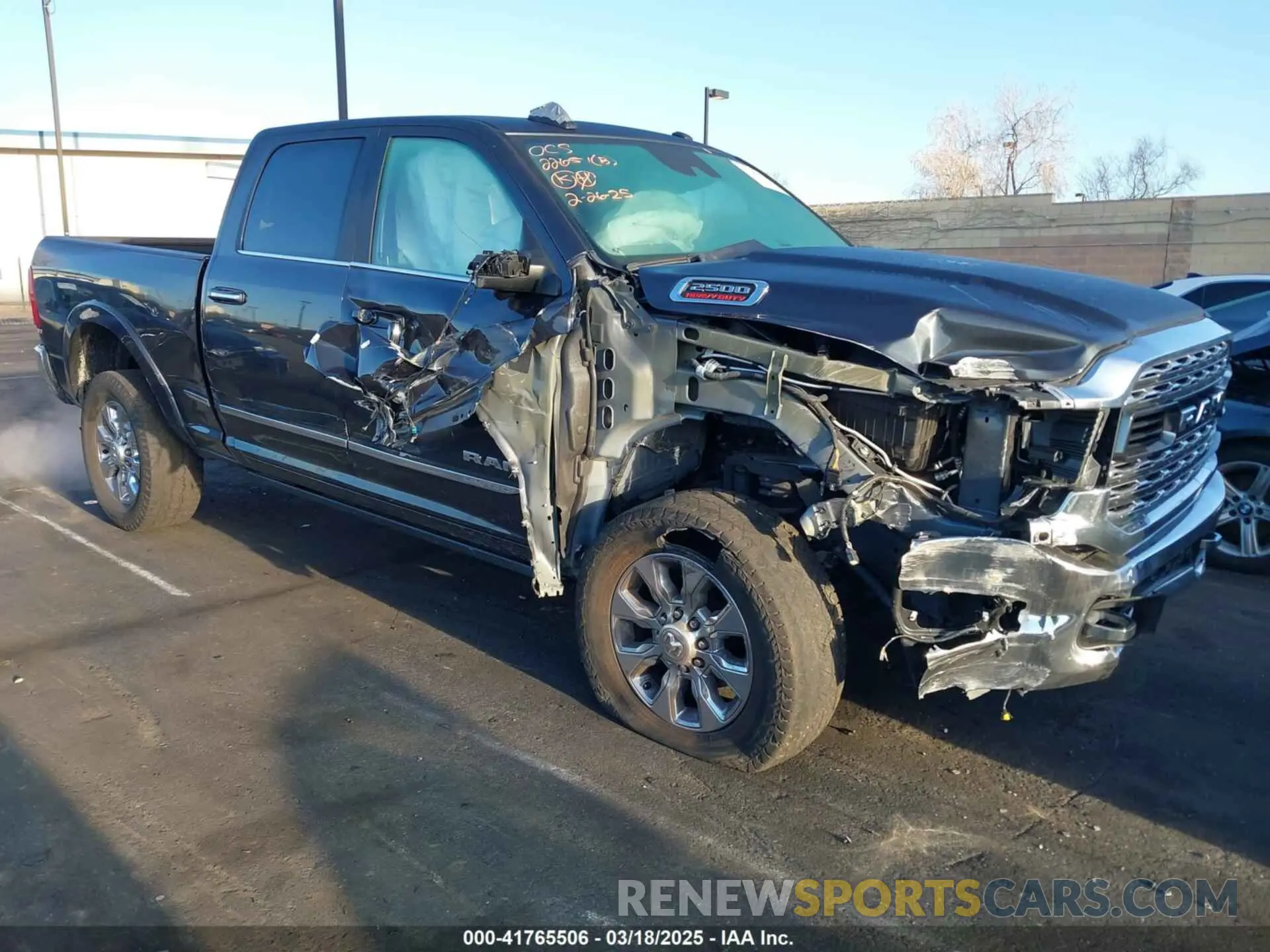 6 Photograph of a damaged car 3C6UR5SJ5MG500657 RAM 2500 2021