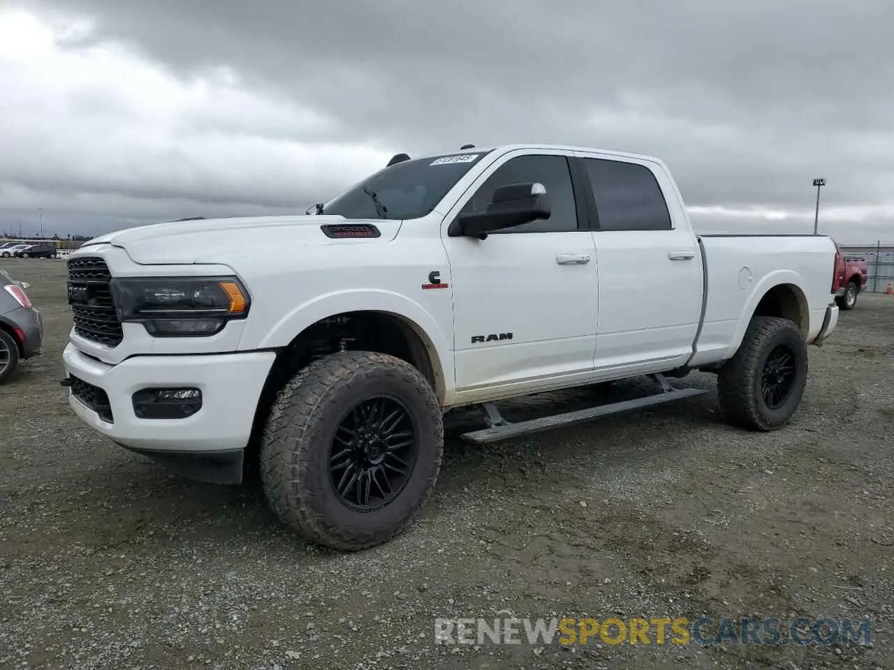 1 Photograph of a damaged car 3C6UR5SL5MG653685 RAM 2500 2021