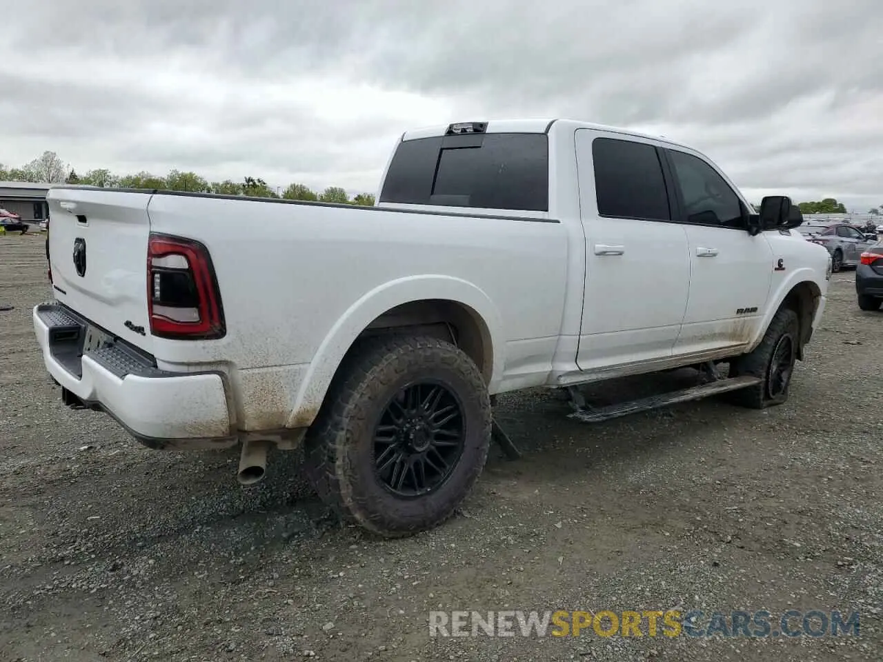 3 Photograph of a damaged car 3C6UR5SL5MG653685 RAM 2500 2021