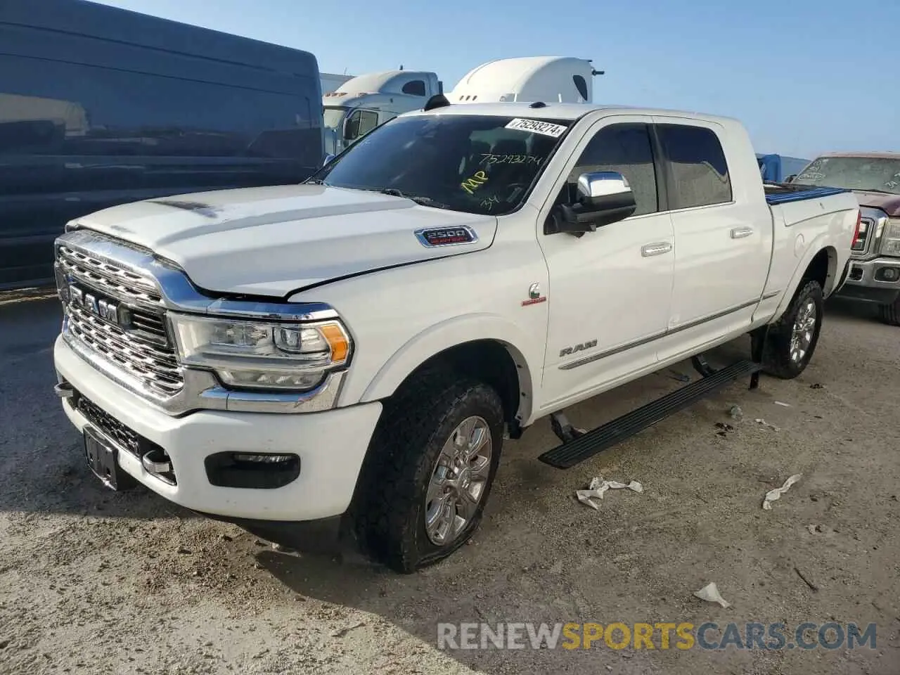 1 Photograph of a damaged car 3C6UR5TL8MG501236 RAM 2500 2021