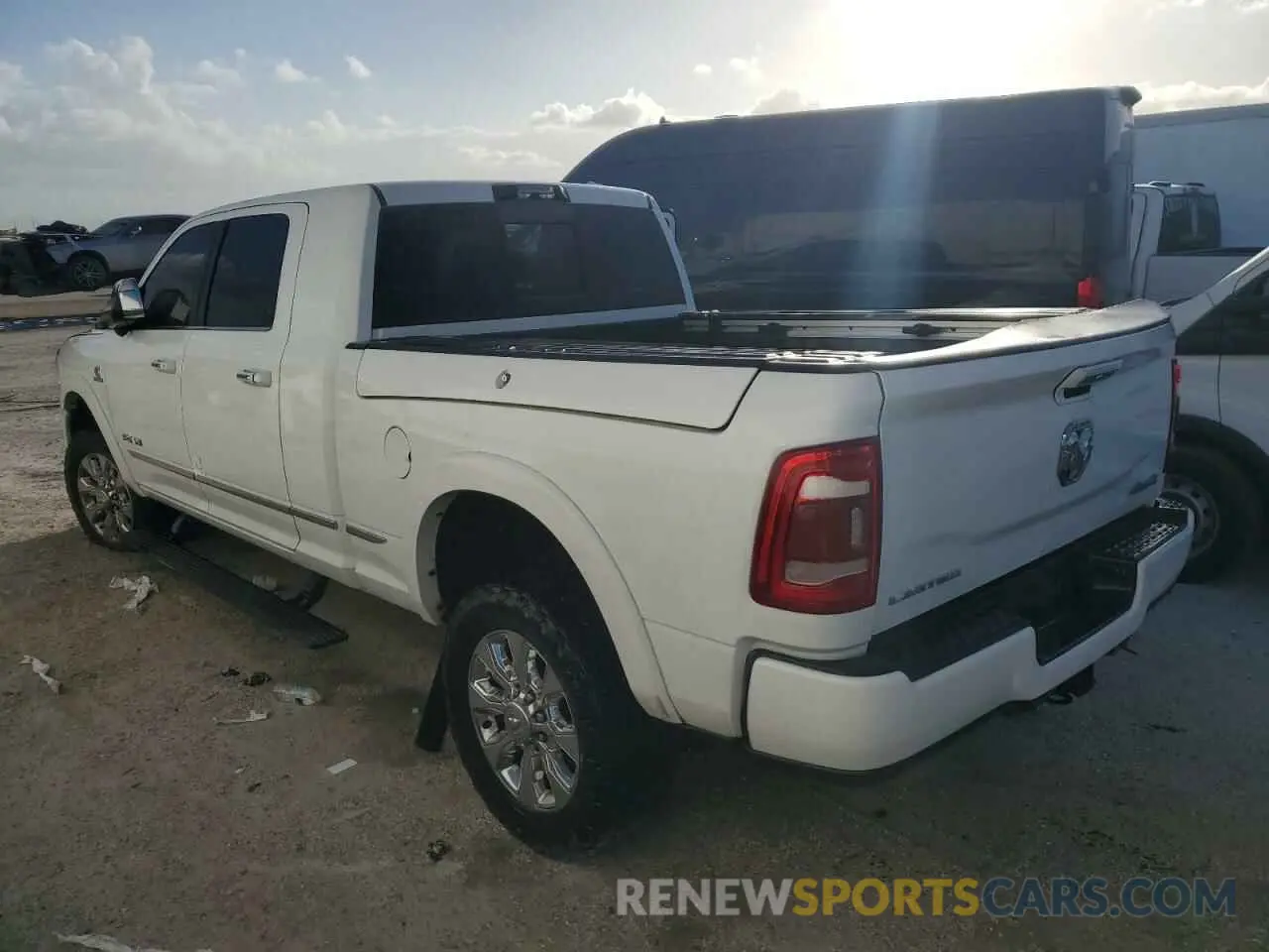 2 Photograph of a damaged car 3C6UR5TL8MG501236 RAM 2500 2021