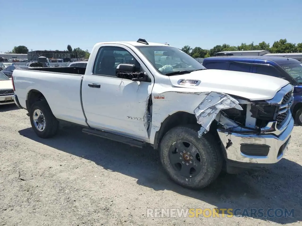 4 Photograph of a damaged car 3C6MR5AJ9NG202258 RAM 2500 2022
