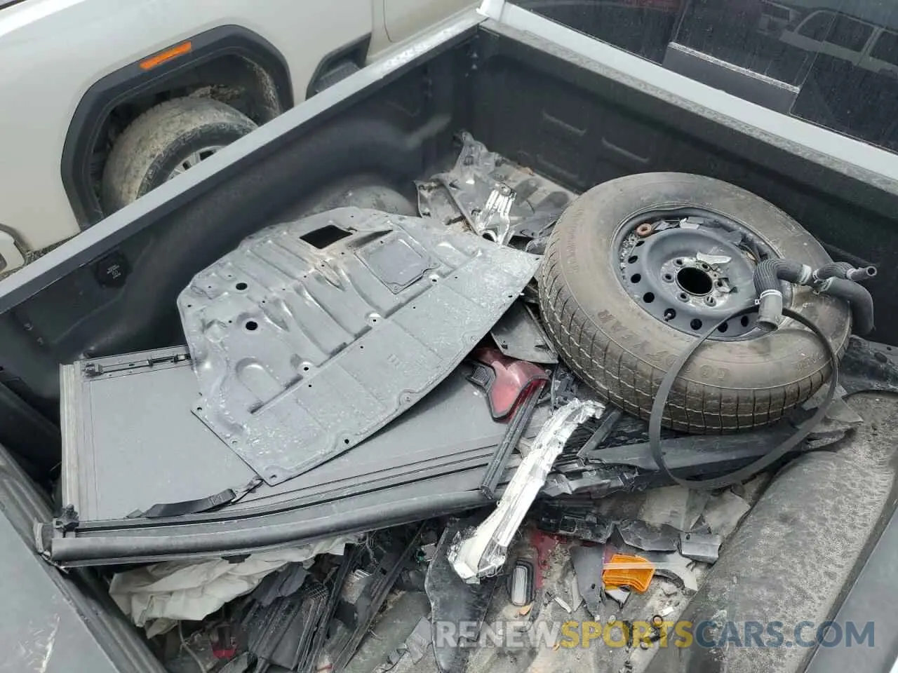 13 Photograph of a damaged car 3C6TR5EJ7NG250766 RAM 2500 2022