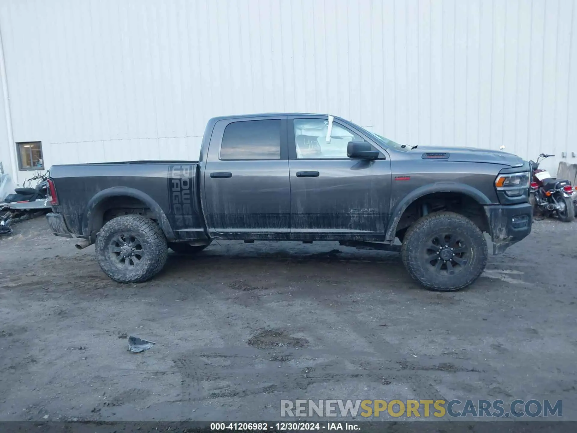 13 Photograph of a damaged car 3C6TR5EJ9NG165685 RAM 2500 2022