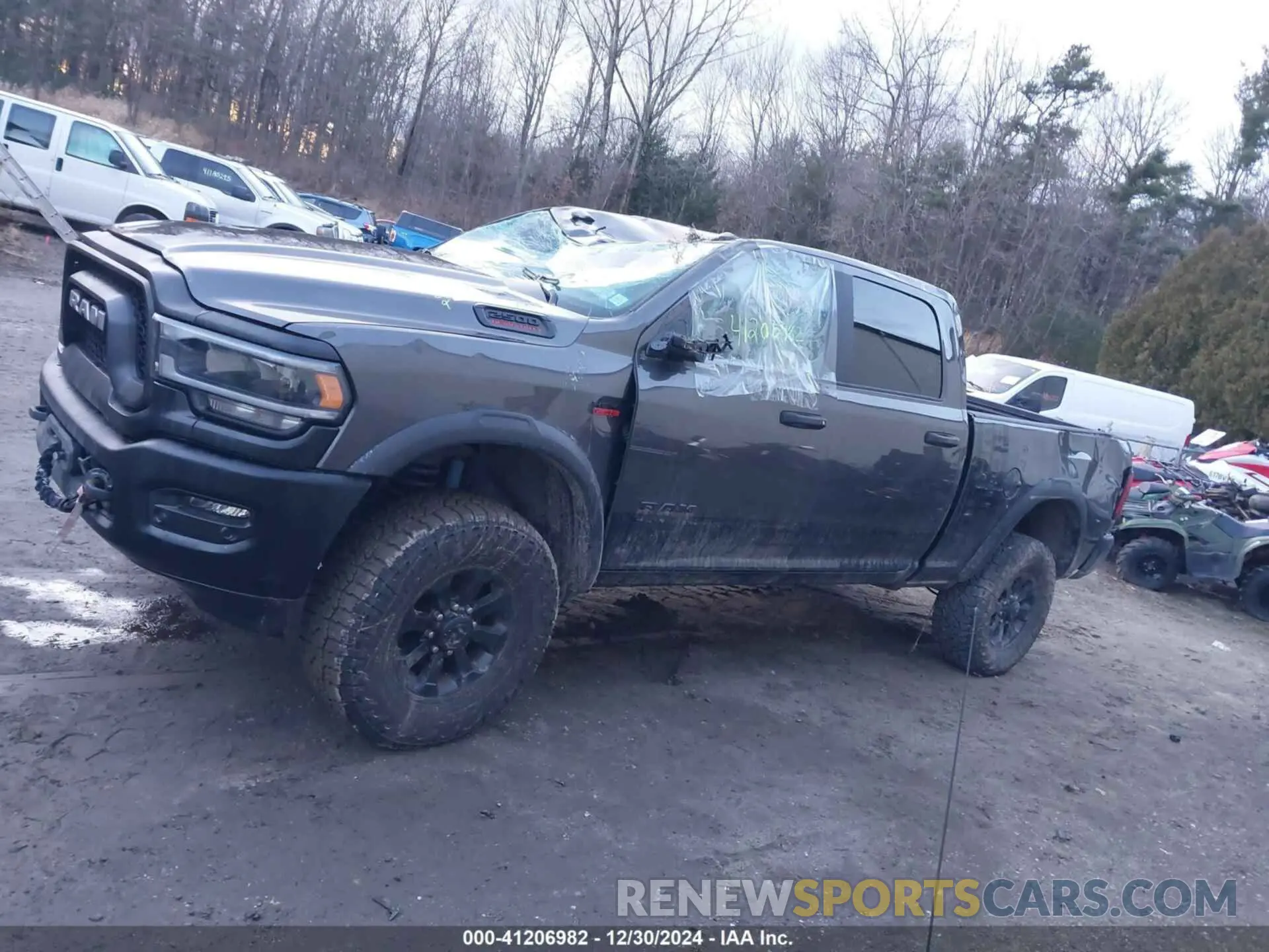 14 Photograph of a damaged car 3C6TR5EJ9NG165685 RAM 2500 2022