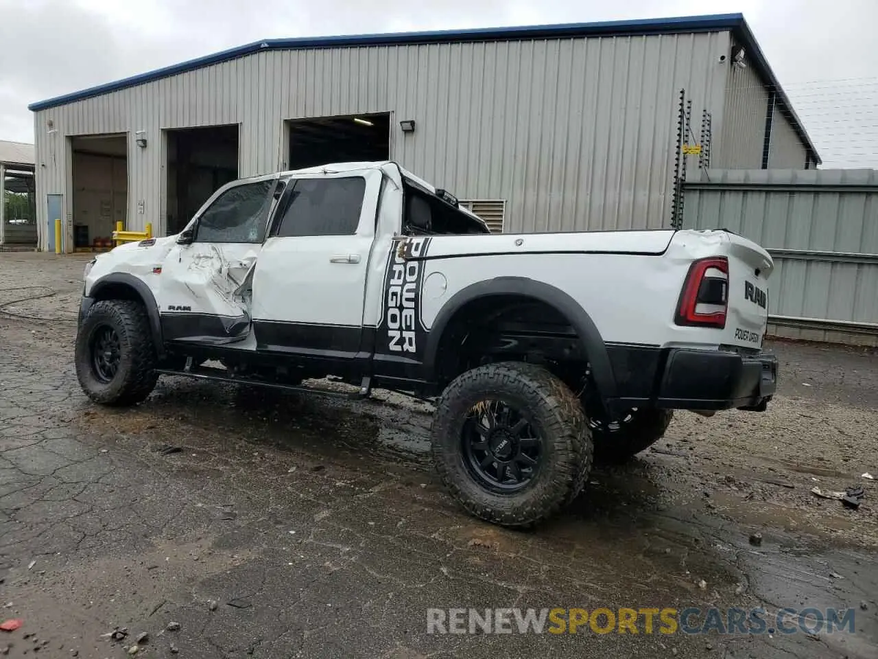2 Photograph of a damaged car 3C6TR5EJ9NG222841 RAM 2500 2022