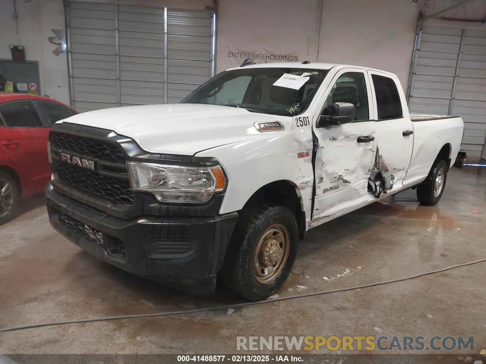 2 Photograph of a damaged car 3C6UR4HJ0NG120662 RAM 2500 2022