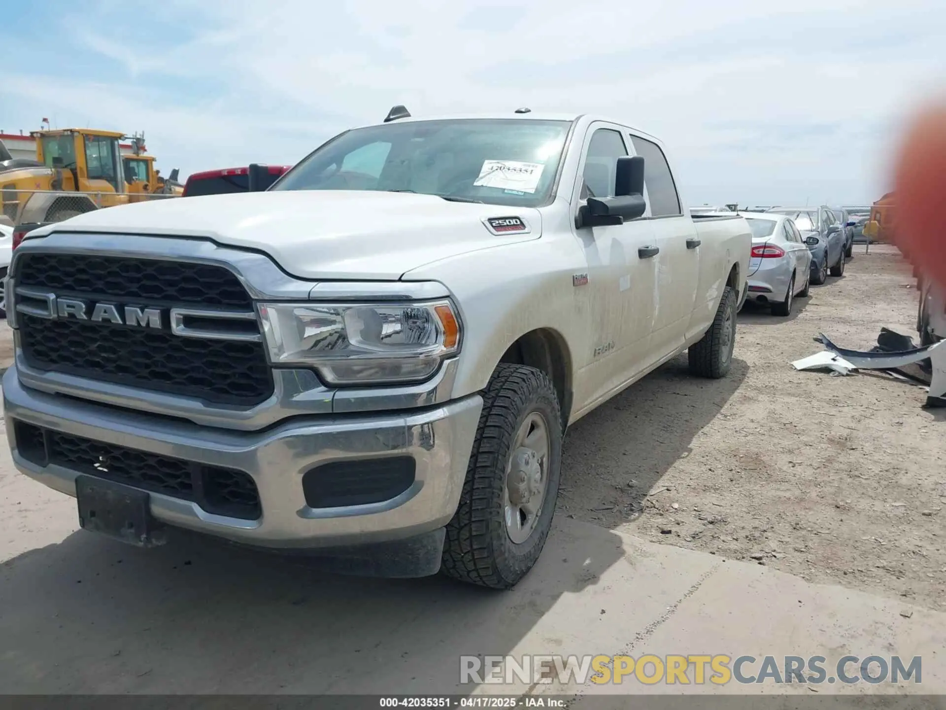 2 Photograph of a damaged car 3C6UR4HJ5NG337737 RAM 2500 2022