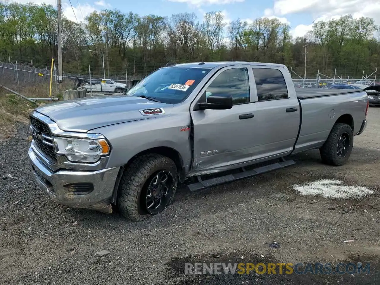 1 Photograph of a damaged car 3C6UR4HJ8NG340275 RAM 2500 2022
